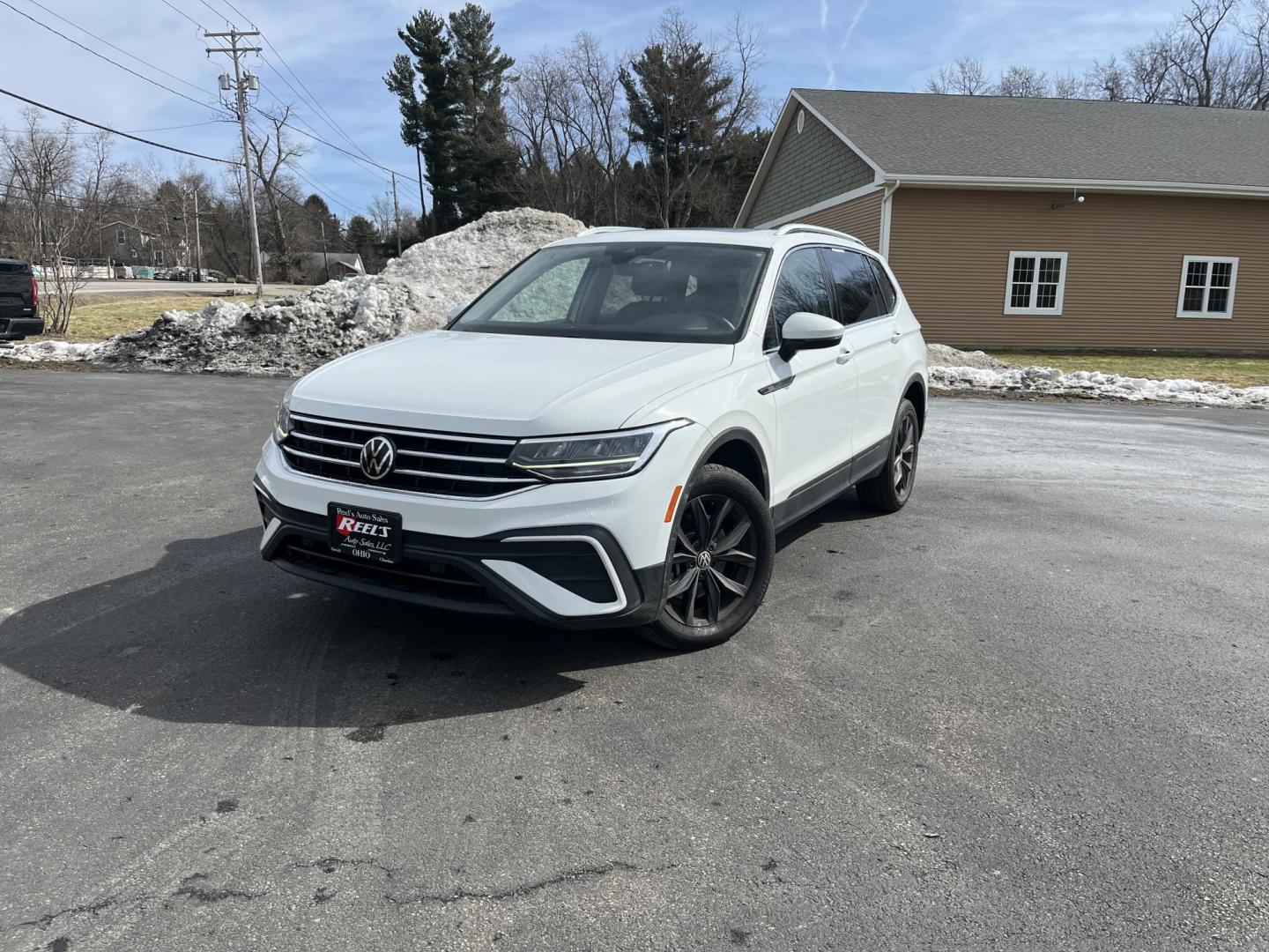 2022 White /Black Volkswagen Tiguan SE 4Motion (3VV2B7AX6NM) with an 2.0L I4 DOHC 16V Turbo engine, Automatic transmission, located at 11115 Chardon Rd. , Chardon, OH, 44024, (440) 214-9705, 41.580246, -81.241943 - 2022 Volkswagen Tiguan SE AWD – Premium Comfort, All-Weather Confidence, and Loaded with Advanced Safety & Tech! This 2022 Volkswagen Tiguan SE AWD is the perfect upscale crossover that’s ready for family adventures, daily commutes, or weekend getaways! Powered by a responsive 2.0L Turbocharged - Photo#0