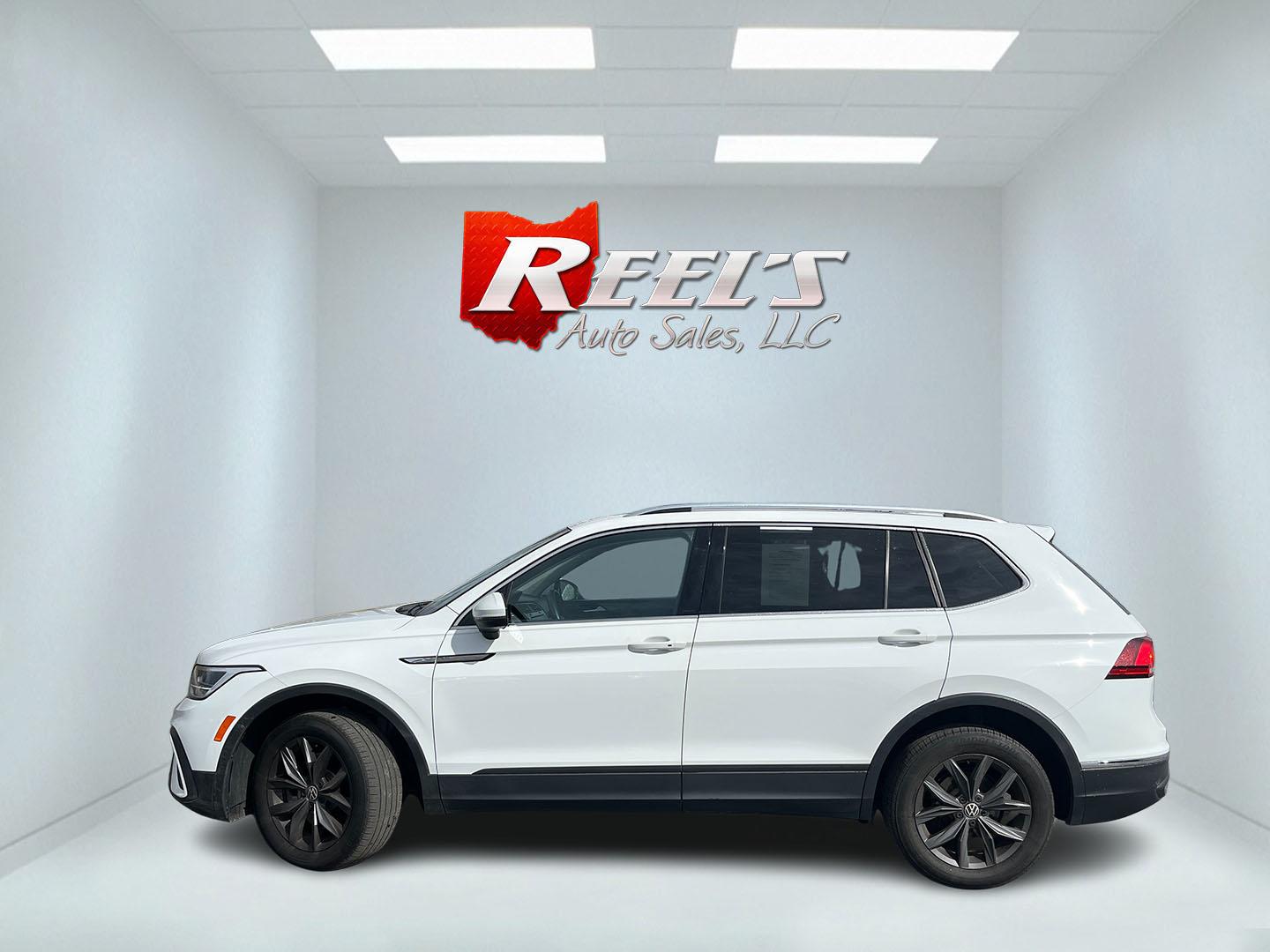 2022 White /Black Volkswagen Tiguan SE 4Motion (3VV2B7AX6NM) with an 2.0L I4 DOHC 16V Turbo engine, Automatic transmission, located at 11115 Chardon Rd. , Chardon, OH, 44024, (440) 214-9705, 41.580246, -81.241943 - Photo#11