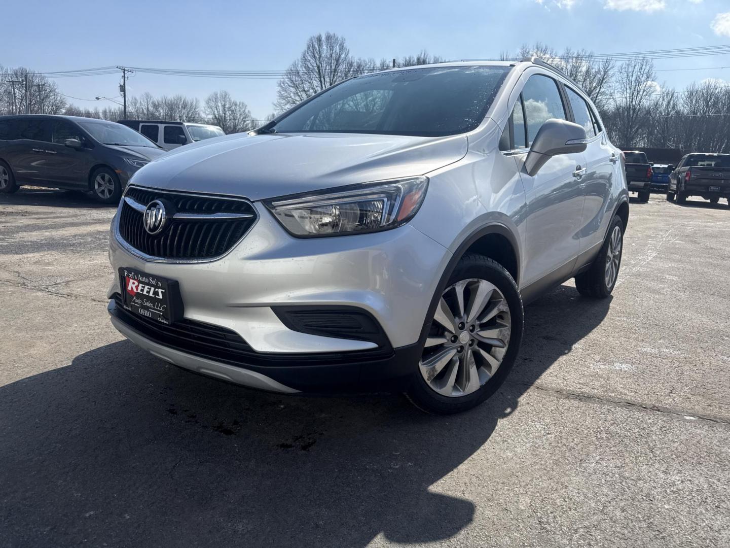 2017 Silver /Black Buick Encore Preferred AWD (KL4CJESB4HB) with an 1.4L I4 DOHC 16V Turbo engine, Automatic transmission, located at 547 E. Main St., Orwell, OH, 44076, (440) 437-5893, 41.535435, -80.847855 - 2017 Buick Encore Preferred AWD – Compact Luxury with Turbo Pep, All-Weather Grip, and Smart Everyday Features! This sharp 2017 Buick Encore Preferred AWD is the ideal upscale crossover that’s easy to love and even easier on fuel! Powered by a lively 1.4L Turbocharged EcoTec I4 engine paired wi - Photo#0