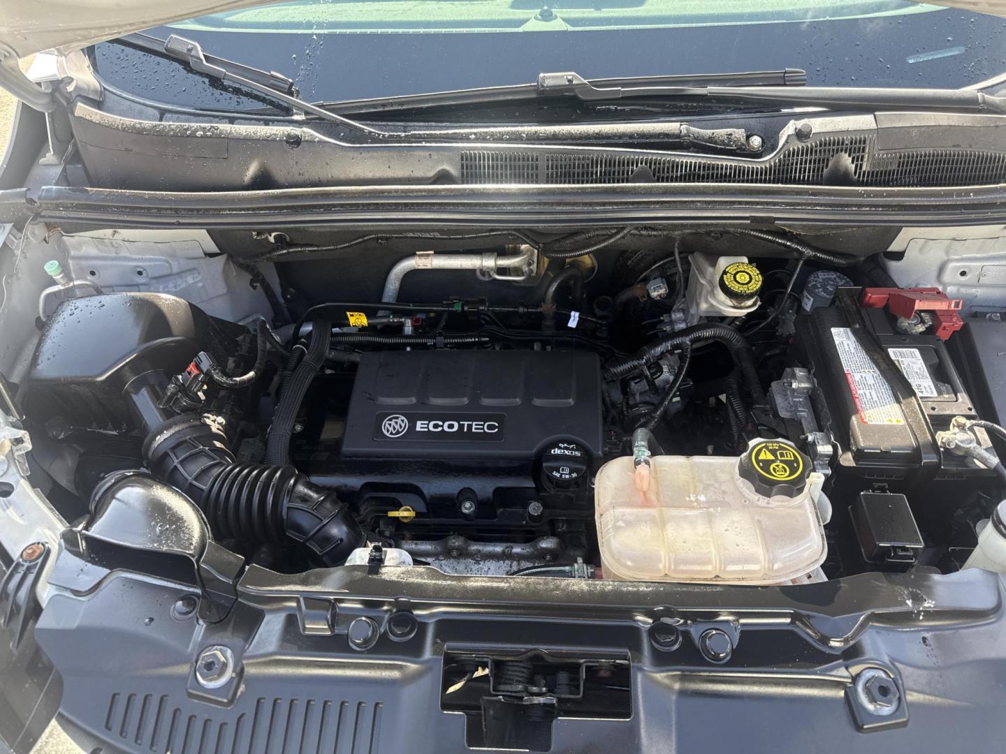 2017 Silver /Black Buick Encore Preferred AWD (KL4CJESB4HB) with an 1.4L I4 DOHC 16V Turbo engine, Automatic transmission, located at 547 E. Main St., Orwell, OH, 44076, (440) 437-5893, 41.535435, -80.847855 - 2017 Buick Encore Preferred AWD – Compact Luxury with Turbo Pep, All-Weather Grip, and Smart Everyday Features! This sharp 2017 Buick Encore Preferred AWD is the ideal upscale crossover that’s easy to love and even easier on fuel! Powered by a lively 1.4L Turbocharged EcoTec I4 engine paired wi - Photo#6