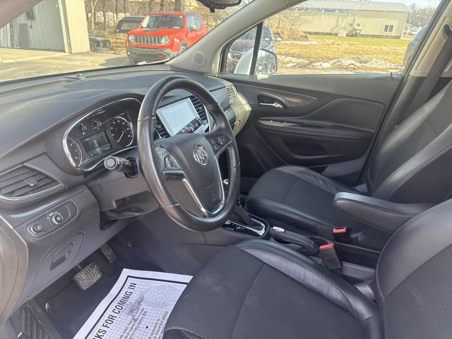 2017 Silver /Black Buick Encore Preferred AWD (KL4CJESB4HB) with an 1.4L I4 DOHC 16V Turbo engine, Automatic transmission, located at 547 E. Main St., Orwell, OH, 44076, (440) 437-5893, 41.535435, -80.847855 - 2017 Buick Encore Preferred AWD – Compact Luxury with Turbo Pep, All-Weather Grip, and Smart Everyday Features! This sharp 2017 Buick Encore Preferred AWD is the ideal upscale crossover that’s easy to love and even easier on fuel! Powered by a lively 1.4L Turbocharged EcoTec I4 engine paired wi - Photo#7