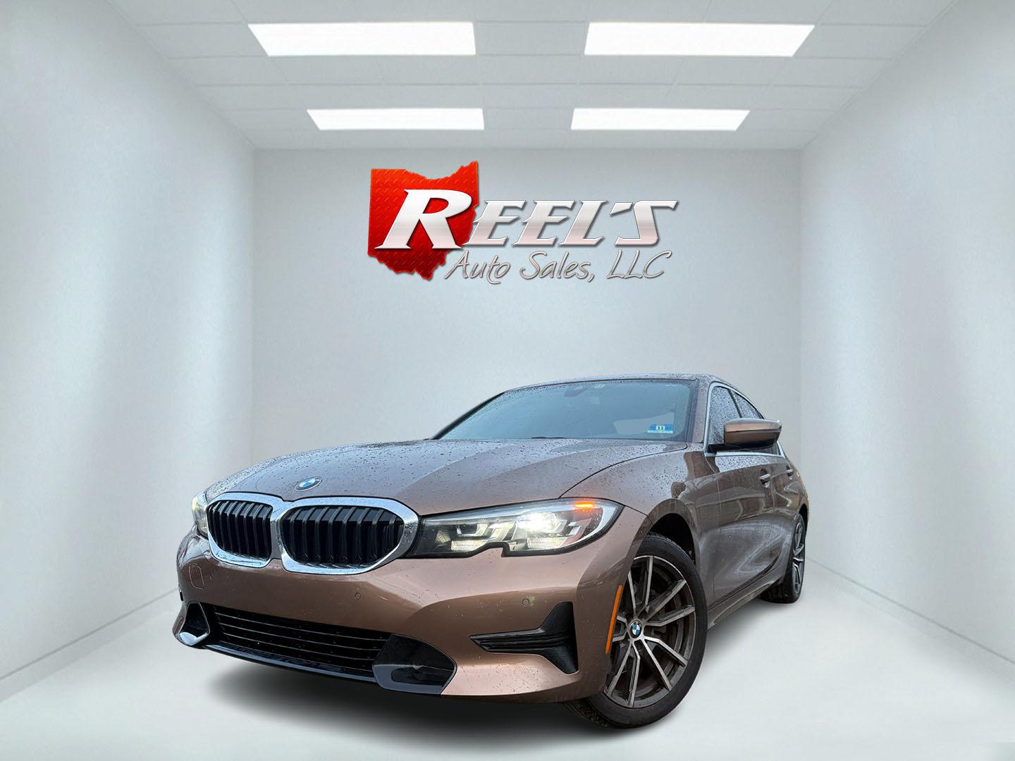 2020 Brown /Black BMW 3 Serires 330I X Drive (WBA5R7C01LF) with an 2.0L I4 16V DOHC Turbo engine, Automatic transmission, located at 11115 Chardon Rd. , Chardon, OH, 44024, (440) 214-9705, 41.580246, -81.241943 - This stunning 2020 BMW 330i xDrive is the ultimate blend of exhilarating performance and refined everyday comfort! Powered by a silky 2.0L Turbocharged I4 engine delivering rocket-like acceleration—0-60 in just 5.3 seconds—through a lightning-fast 8-speed automatic transmission and intelligent x - Photo#0