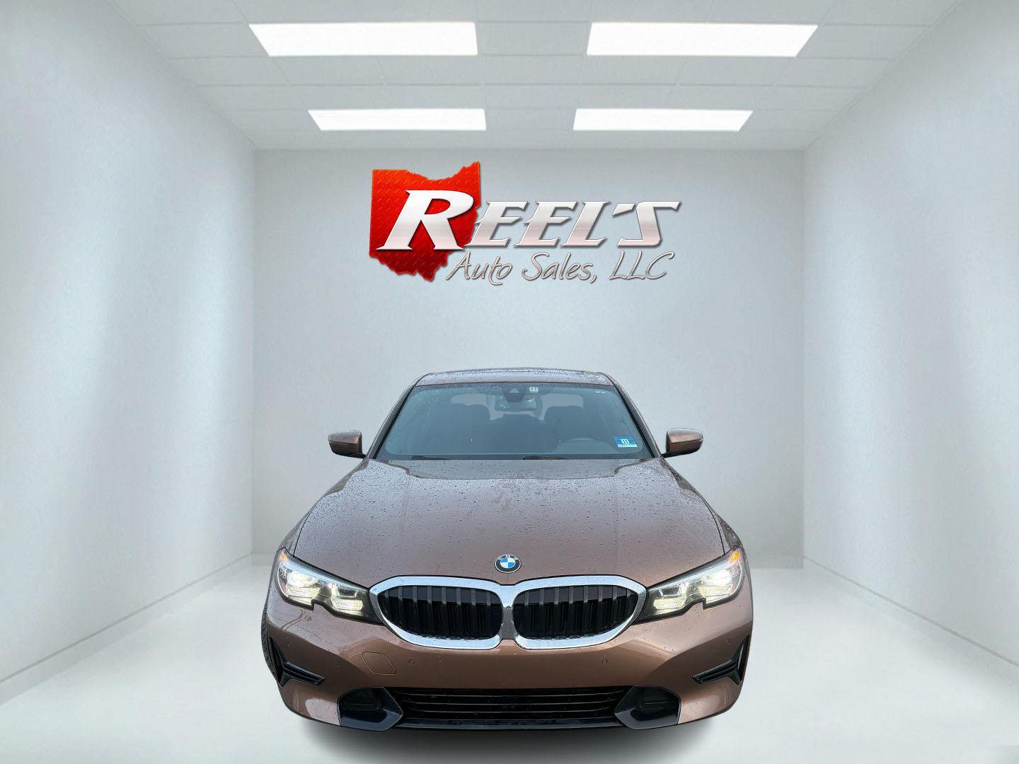 2020 Brown /Black BMW 3 Serires 330I X Drive (WBA5R7C01LF) with an 2.0L I4 16V DOHC Turbo engine, Automatic transmission, located at 11115 Chardon Rd. , Chardon, OH, 44024, (440) 214-9705, 41.580246, -81.241943 - This stunning 2020 BMW 330i xDrive is the ultimate blend of exhilarating performance and refined everyday comfort! Powered by a silky 2.0L Turbocharged I4 engine delivering rocket-like acceleration—0-60 in just 5.3 seconds—through a lightning-fast 8-speed automatic transmission and intelligent x - Photo#1