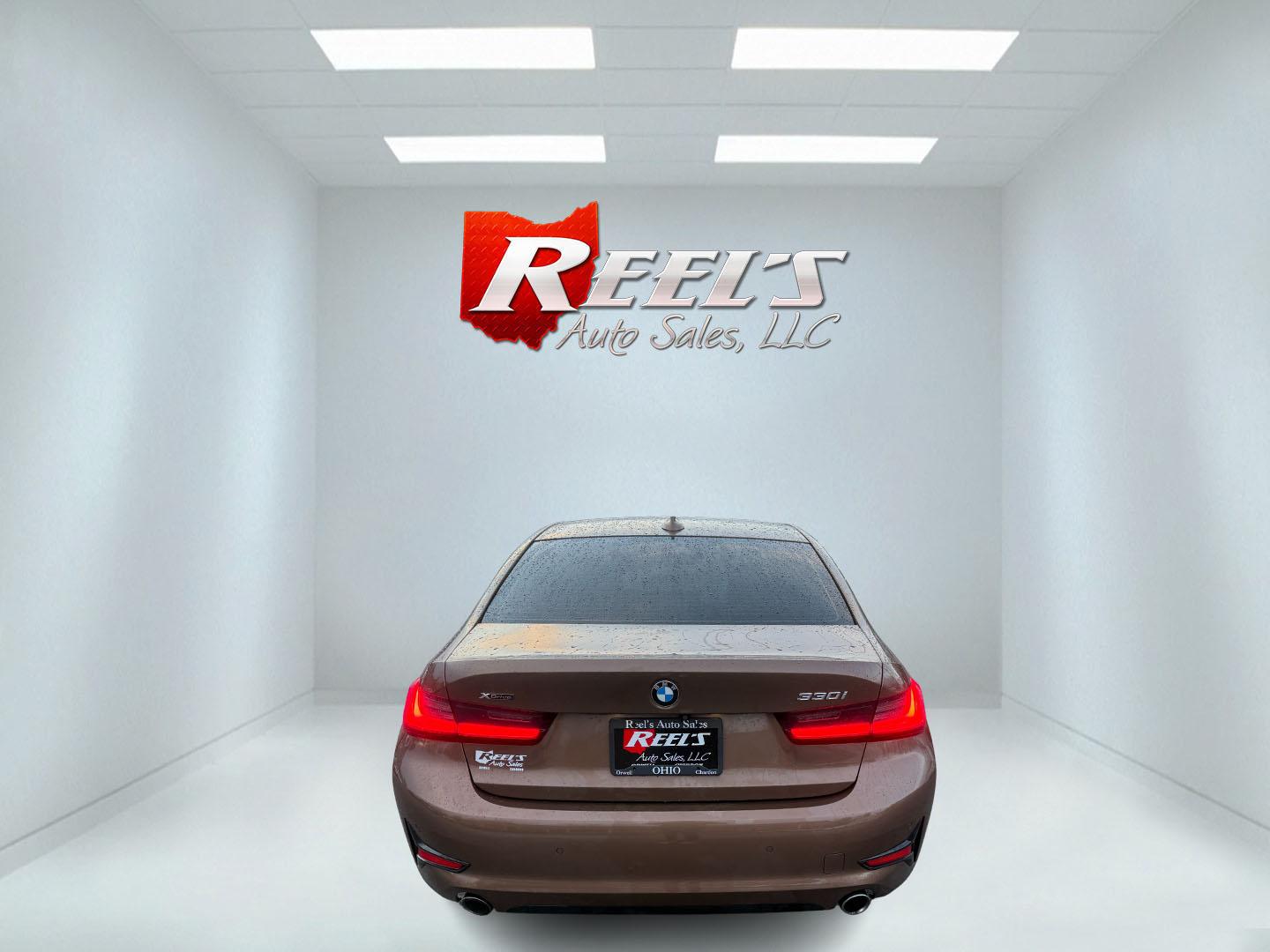 2020 Brown /Black BMW 3 Serires 330I X Drive (WBA5R7C01LF) with an 2.0L I4 16V DOHC Turbo engine, Automatic transmission, located at 11115 Chardon Rd. , Chardon, OH, 44024, (440) 214-9705, 41.580246, -81.241943 - This stunning 2020 BMW 330i xDrive is the ultimate blend of exhilarating performance and refined everyday comfort! Powered by a silky 2.0L Turbocharged I4 engine delivering rocket-like acceleration—0-60 in just 5.3 seconds—through a lightning-fast 8-speed automatic transmission and intelligent x - Photo#25