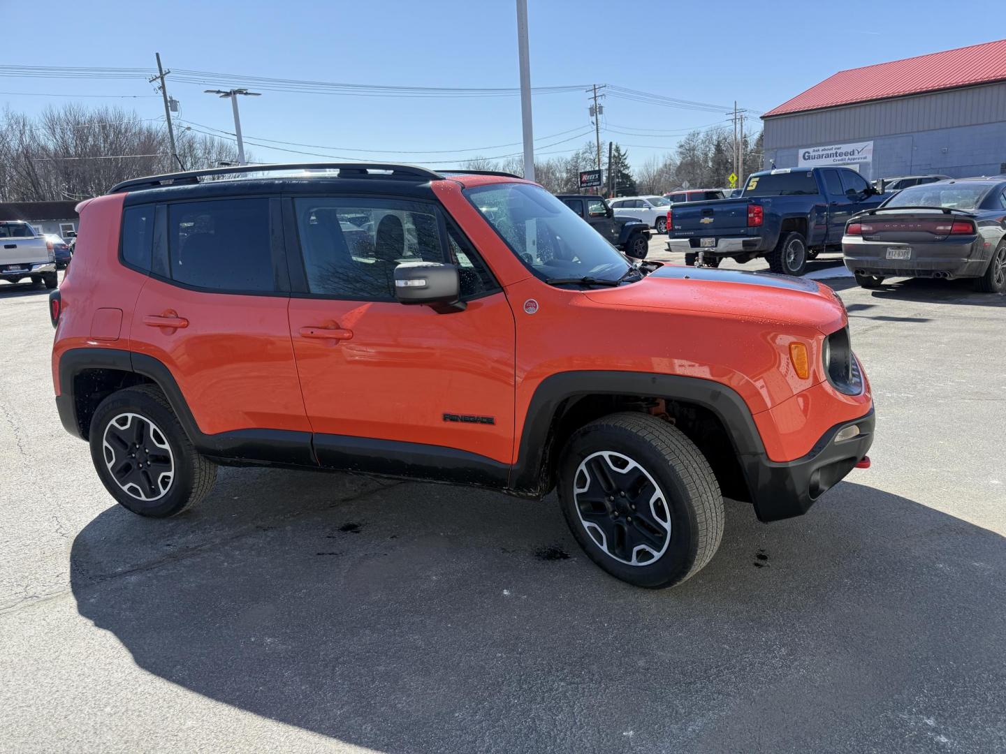 2017 Orange /Black Jeep Renegade Trailhawk (ZACCJBCBXHP) with an 2.4L I4 DOHC 16V engine, Automatic transmission, located at 547 E. Main St., Orwell, OH, 44076, (440) 437-5893, 41.535435, -80.847855 - 2017 Jeep Renegade Trailhawk 4×4 – Trail-Rated Beast with Off-Road Attitude and Everyday Usability! This rugged 2017 Jeep Renegade Trailhawk 4×4 is built for adventure and ready to tackle trails or Ohio backroads with confidence! Powered by a capable 2.4L I4 MultiAir engine paired with a smooth - Photo#3