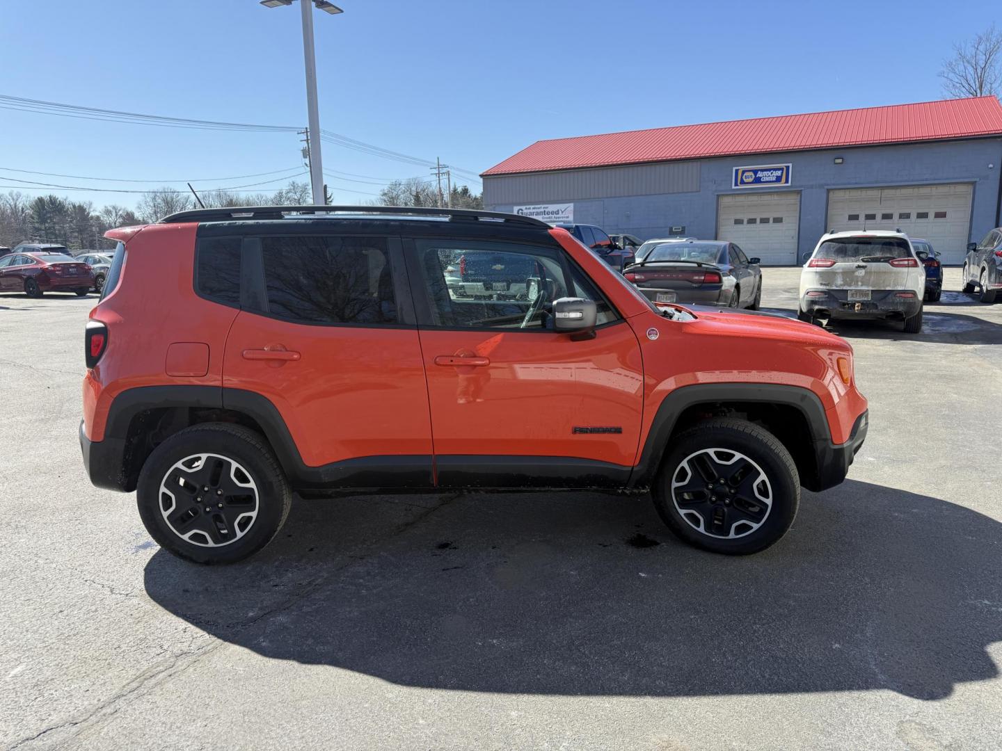 2017 Orange /Black Jeep Renegade Trailhawk (ZACCJBCBXHP) with an 2.4L I4 DOHC 16V engine, Automatic transmission, located at 547 E. Main St., Orwell, OH, 44076, (440) 437-5893, 41.535435, -80.847855 - 2017 Jeep Renegade Trailhawk 4×4 – Trail-Rated Beast with Off-Road Attitude and Everyday Usability! This rugged 2017 Jeep Renegade Trailhawk 4×4 is built for adventure and ready to tackle trails or Ohio backroads with confidence! Powered by a capable 2.4L I4 MultiAir engine paired with a smooth - Photo#25