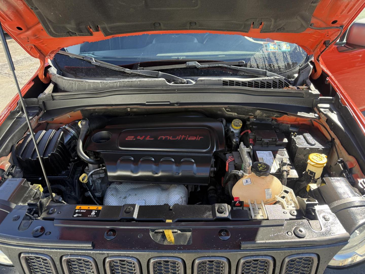 2017 Orange /Black Jeep Renegade Trailhawk (ZACCJBCBXHP) with an 2.4L I4 DOHC 16V engine, Automatic transmission, located at 547 E. Main St., Orwell, OH, 44076, (440) 437-5893, 41.535435, -80.847855 - 2017 Jeep Renegade Trailhawk 4×4 – Trail-Rated Beast with Off-Road Attitude and Everyday Usability! This rugged 2017 Jeep Renegade Trailhawk 4×4 is built for adventure and ready to tackle trails or Ohio backroads with confidence! Powered by a capable 2.4L I4 MultiAir engine paired with a smooth - Photo#7