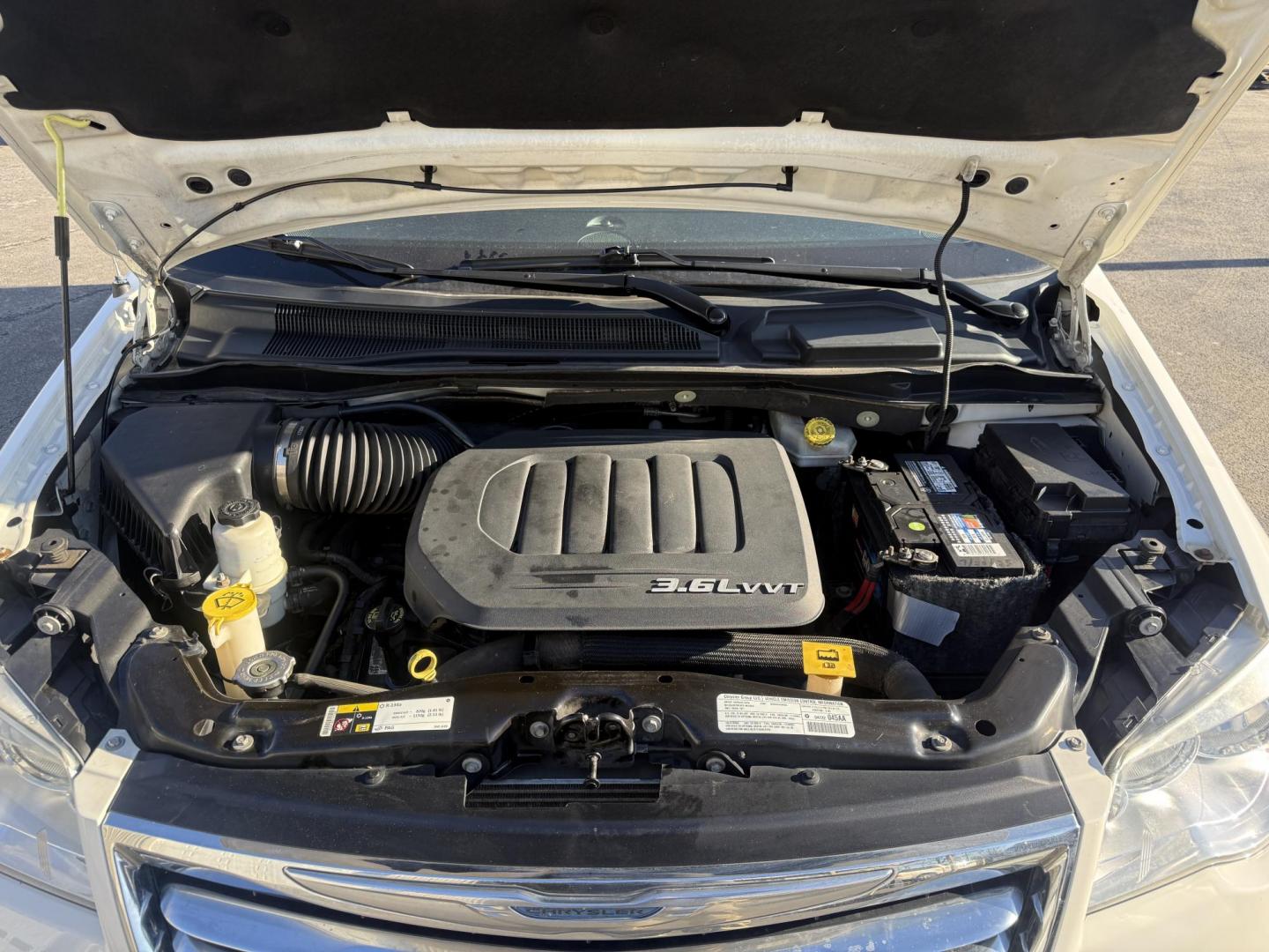 2013 White /Tan Chrysler Town & Country Touring (2C4RC1BG5DR) with an 3.6L V6 DOHC 24V engine, Automatic transmission, located at 547 E. Main St., Orwell, OH, 44076, (440) 437-5893, 41.535435, -80.847855 - 2013 Chrysler Town & Country Touring – Spacious Family Minivan with Stow 'n Go Magic and Loaded Comfort Features! This 2013 Chrysler Town & Country Touring is the ultimate family hauler that makes every trip easy and enjoyable! Powered by a smooth, proven 3.6L V6 Pentastar engine paired with a re - Photo#6