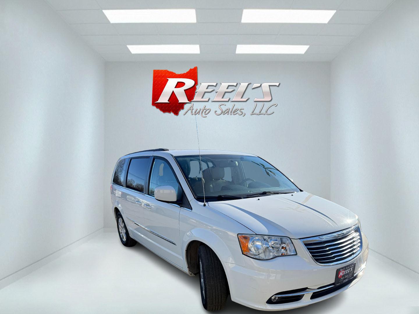 2013 White /Tan Chrysler Town & Country Touring (2C4RC1BG5DR) with an 3.6L V6 DOHC 24V engine, Automatic transmission, located at 547 E. Main St., Orwell, OH, 44076, (440) 437-5893, 41.535435, -80.847855 - 2013 Chrysler Town & Country Touring – Spacious Family Minivan with Stow 'n Go Magic and Loaded Comfort Features! This 2013 Chrysler Town & Country Touring is the ultimate family hauler that makes every trip easy and enjoyable! Powered by a smooth, proven 3.6L V6 Pentastar engine paired with a re - Photo#2
