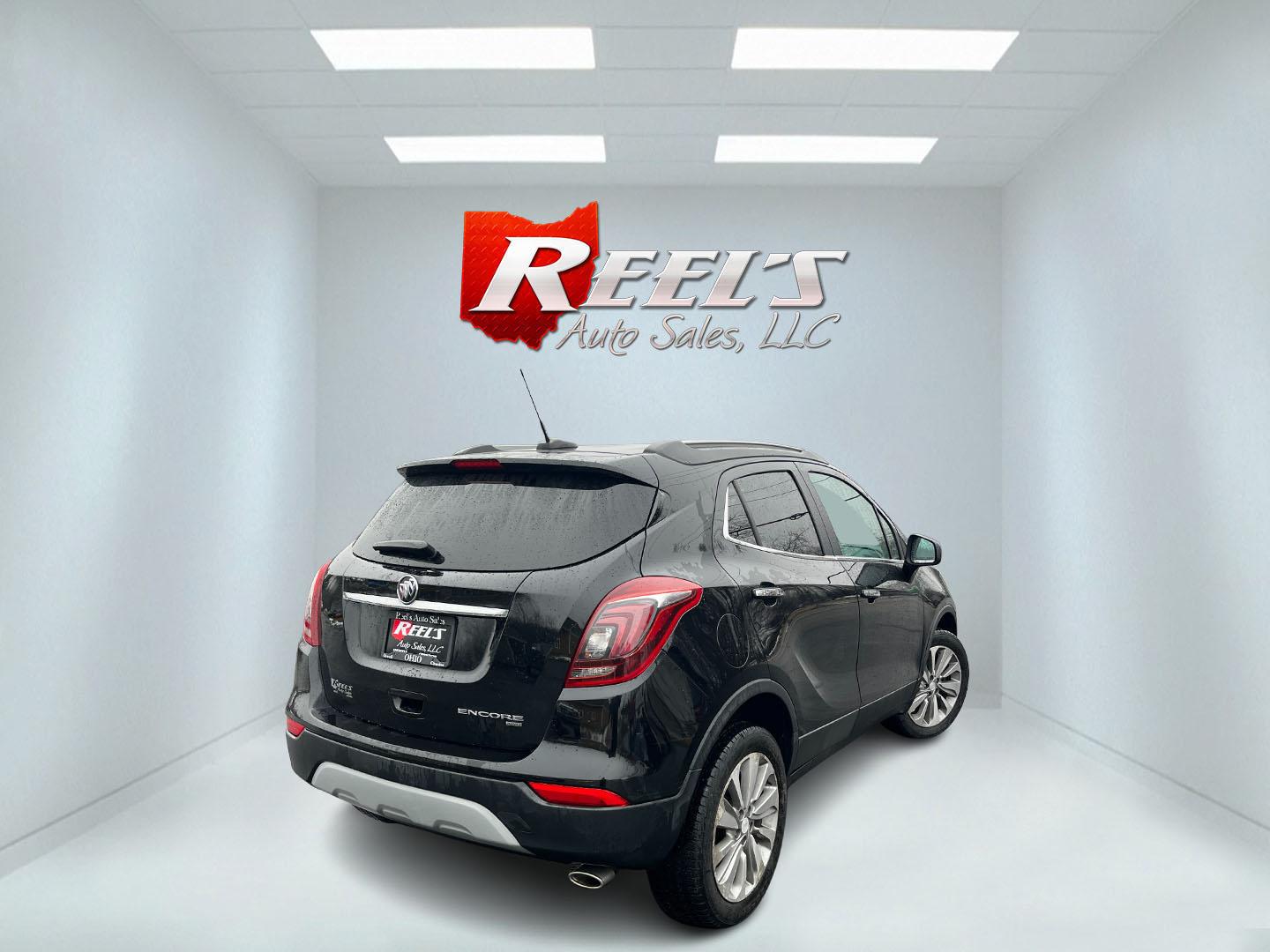 2020 Black /Black Buick Encore Preferred AWD (KL4CJESB6LB) with an 1.4L I4 DOHC 16V TURBO engine, Automatic transmission, located at 11115 Chardon Rd. , Chardon, OH, 44024, (440) 214-9705, 41.580246, -81.241943 - 2020 Buick Encore Preferred AWD – Compact Luxury with Turbo Efficiency, All-Weather Confidence, and Premium Touches! This sharp 2020 Buick Encore Preferred AWD is the perfect upscale crossover that’s fun to drive, easy on fuel, and ready for Ohio’s changing seasons! Powered by a peppy 1.4L Tu - Photo#6