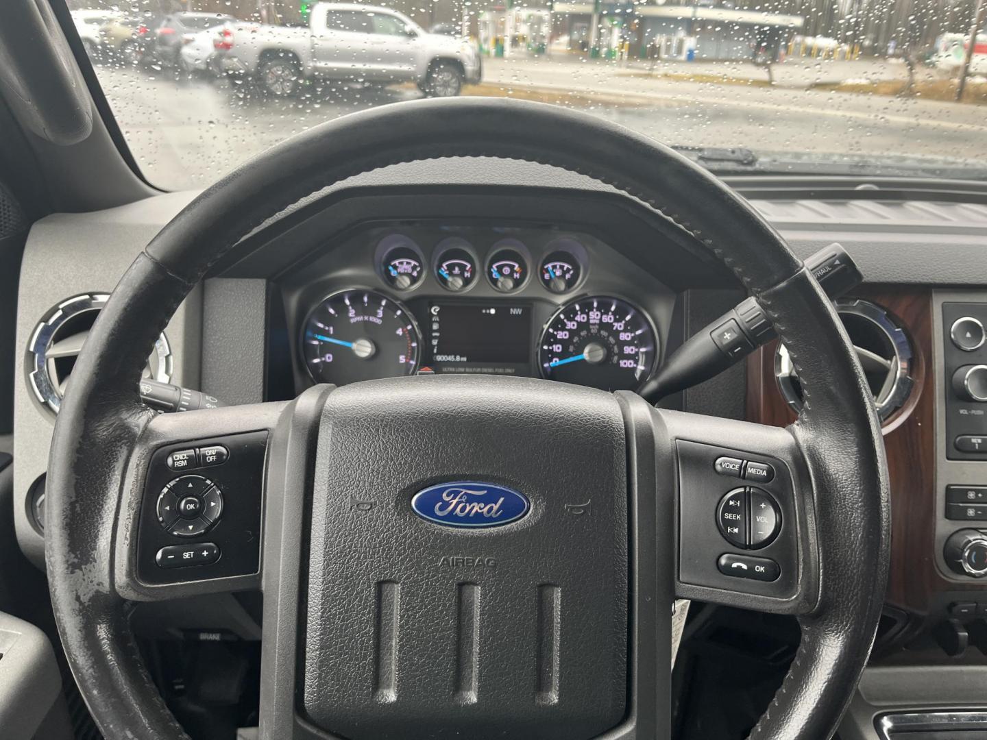 2011 Green /Black Ford F-250 SD Lariat Crew Cab 4WD (1FT7W2BT9BE) with an 6.7L V8 OHV 16V DIESEL engine, Automatic transmission, located at 11115 Chardon Rd. , Chardon, OH, 44024, (440) 214-9705, 41.580246, -81.241943 - 2011 Ford F-250 Lariat Crew Cab 4x4 – Heavy-Duty Legend with Power Stroke Diesel Muscle and Premium Lariat Comfort! This beast of a 2011 Ford F-250 Lariat Crew Cab is built to dominate work sites, towing jobs, and long hauls with legendary reliability! Under the hood roars the iconic 6.7L Power S - Photo#20