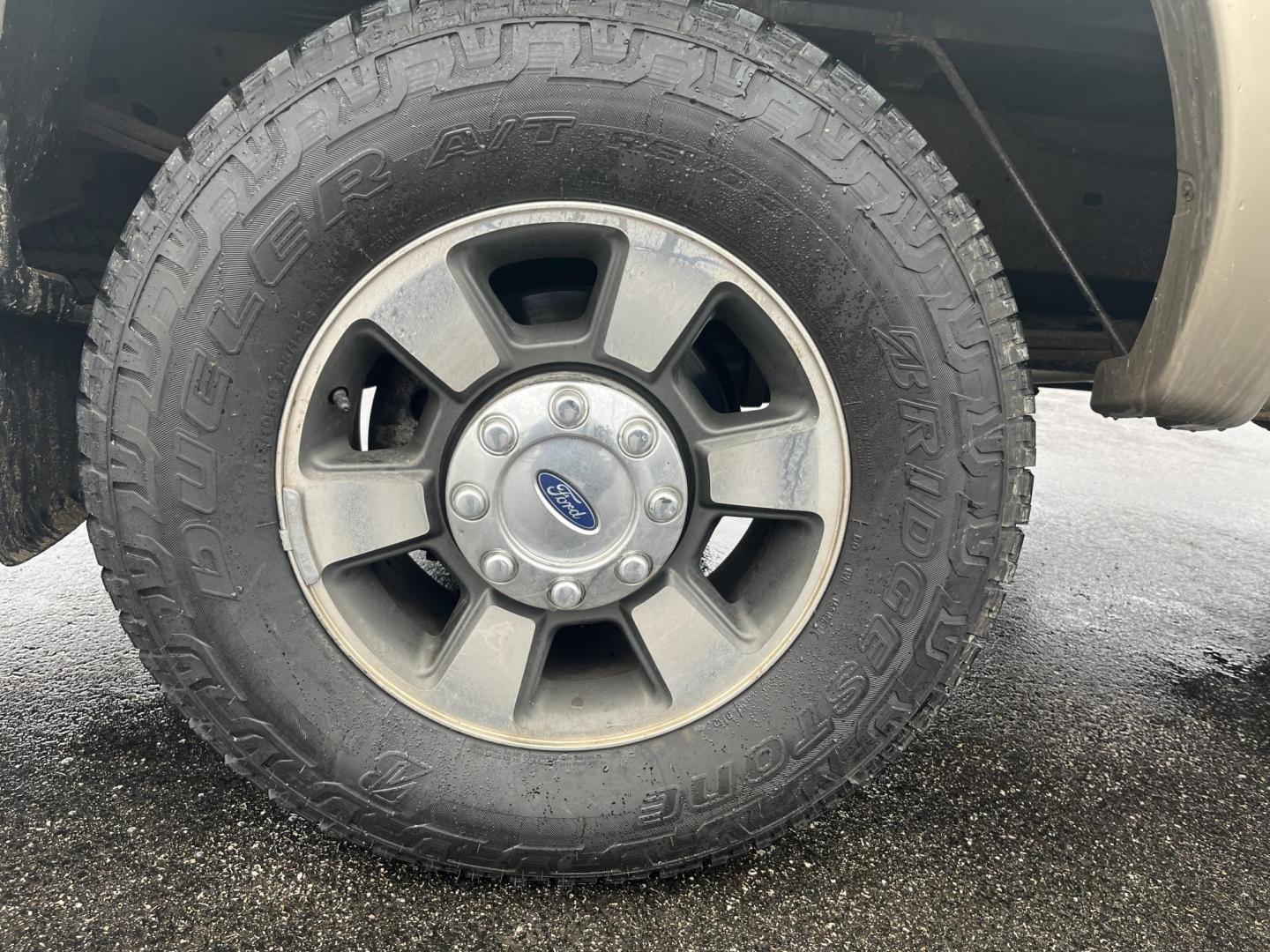 2011 Green /Black Ford F-250 SD Lariat Crew Cab 4WD (1FT7W2BT9BE) with an 6.7L V8 OHV 16V DIESEL engine, Automatic transmission, located at 11115 Chardon Rd. , Chardon, OH, 44024, (440) 214-9705, 41.580246, -81.241943 - 2011 Ford F-250 Lariat Crew Cab 4x4 – Heavy-Duty Legend with Power Stroke Diesel Muscle and Premium Lariat Comfort! This beast of a 2011 Ford F-250 Lariat Crew Cab is built to dominate work sites, towing jobs, and long hauls with legendary reliability! Under the hood roars the iconic 6.7L Power S - Photo#7