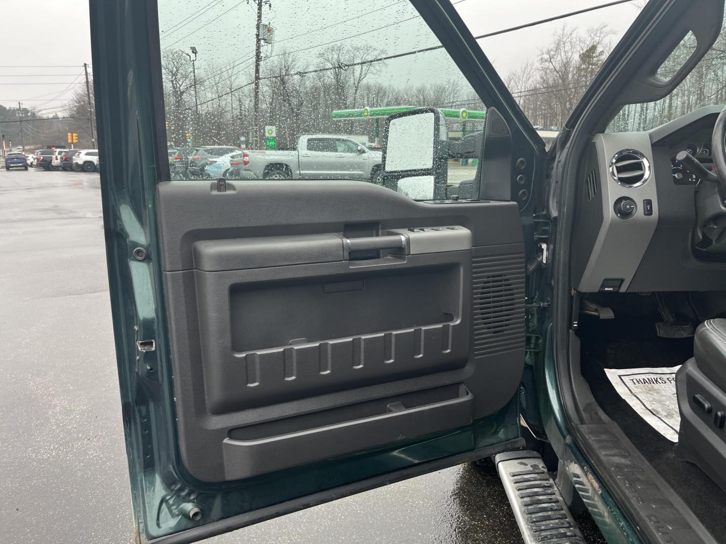 2011 Green /Black Ford F-250 SD Lariat Crew Cab 4WD (1FT7W2BT9BE) with an 6.7L V8 OHV 16V DIESEL engine, Automatic transmission, located at 11115 Chardon Rd. , Chardon, OH, 44024, (440) 214-9705, 41.580246, -81.241943 - 2011 Ford F-250 Lariat Crew Cab 4x4 – Heavy-Duty Legend with Power Stroke Diesel Muscle and Premium Lariat Comfort! This beast of a 2011 Ford F-250 Lariat Crew Cab is built to dominate work sites, towing jobs, and long hauls with legendary reliability! Under the hood roars the iconic 6.7L Power S - Photo#15