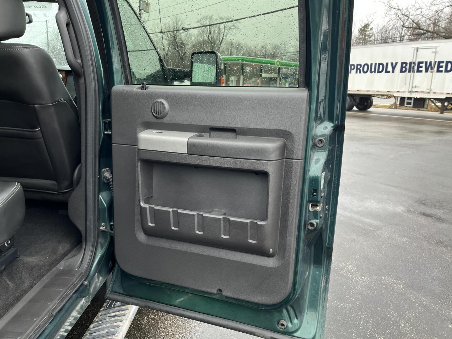 2011 Green /Black Ford F-250 SD Lariat Crew Cab 4WD (1FT7W2BT9BE) with an 6.7L V8 OHV 16V DIESEL engine, Automatic transmission, located at 11115 Chardon Rd. , Chardon, OH, 44024, (440) 214-9705, 41.580246, -81.241943 - 2011 Ford F-250 Lariat Crew Cab 4x4 – Heavy-Duty Legend with Power Stroke Diesel Muscle and Premium Lariat Comfort! This beast of a 2011 Ford F-250 Lariat Crew Cab is built to dominate work sites, towing jobs, and long hauls with legendary reliability! Under the hood roars the iconic 6.7L Power S - Photo#30