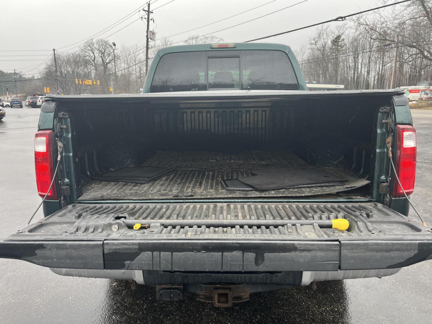 2011 Green /Black Ford F-250 SD Lariat Crew Cab 4WD (1FT7W2BT9BE) with an 6.7L V8 OHV 16V DIESEL engine, Automatic transmission, located at 11115 Chardon Rd. , Chardon, OH, 44024, (440) 214-9705, 41.580246, -81.241943 - 2011 Ford F-250 Lariat Crew Cab 4x4 – Heavy-Duty Legend with Power Stroke Diesel Muscle and Premium Lariat Comfort! This beast of a 2011 Ford F-250 Lariat Crew Cab is built to dominate work sites, towing jobs, and long hauls with legendary reliability! Under the hood roars the iconic 6.7L Power S - Photo#14