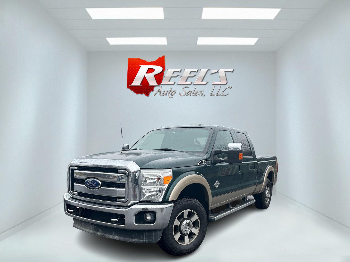 2011 Green /Black Ford F-250 SD Lariat Crew Cab 4WD (1FT7W2BT9BE) with an 6.7L V8 OHV 16V DIESEL engine, Automatic transmission, located at 11115 Chardon Rd. , Chardon, OH, 44024, (440) 214-9705, 41.580246, -81.241943 - 2011 Ford F-250 Lariat Crew Cab 4x4 – Heavy-Duty Legend with Power Stroke Diesel Muscle and Premium Lariat Comfort! This beast of a 2011 Ford F-250 Lariat Crew Cab is built to dominate work sites, towing jobs, and long hauls with legendary reliability! Under the hood roars the iconic 6.7L Power S - Photo#0