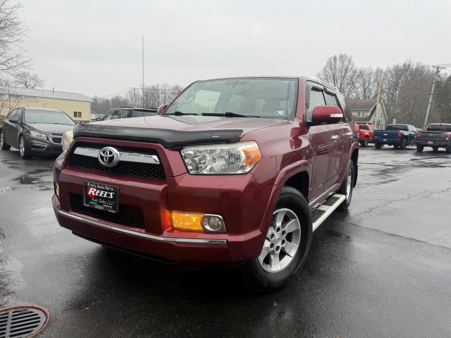 2013 Red /Black Toyota 4Runner SR5 4WD (JTEBU5JR2D5) with an 4.0L V6 DOHC 24V engine, Automatic transmission, located at 547 E. Main St., Orwell, OH, 44076, (440) 437-5893, 41.535435, -80.847855 - 2013 Toyota 4Runner SR5 4WD – Legendary Reliability, Off-Road Ready, and Packed with Practical Features! This rugged 2013 Toyota 4Runner SR5 4WD is the timeless SUV built to last a lifetime and tackle anything you throw at it! Powered by the bulletproof 4.0L V6 engine mated to a durable 5-speed a - Photo#0