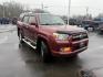 2013 Red /Black Toyota 4Runner SR5 4WD (JTEBU5JR2D5) with an 4.0L V6 DOHC 24V engine, Automatic transmission, located at 547 E. Main St., Orwell, OH, 44076, (440) 437-5893, 41.535435, -80.847855 - 2013 Toyota 4Runner SR5 4WD – Legendary Reliability, Off-Road Ready, and Packed with Practical Features! This rugged 2013 Toyota 4Runner SR5 4WD is the timeless SUV built to last a lifetime and tackle anything you throw at it! Powered by the bulletproof 4.0L V6 engine mated to a durable 5-speed a - Photo#2