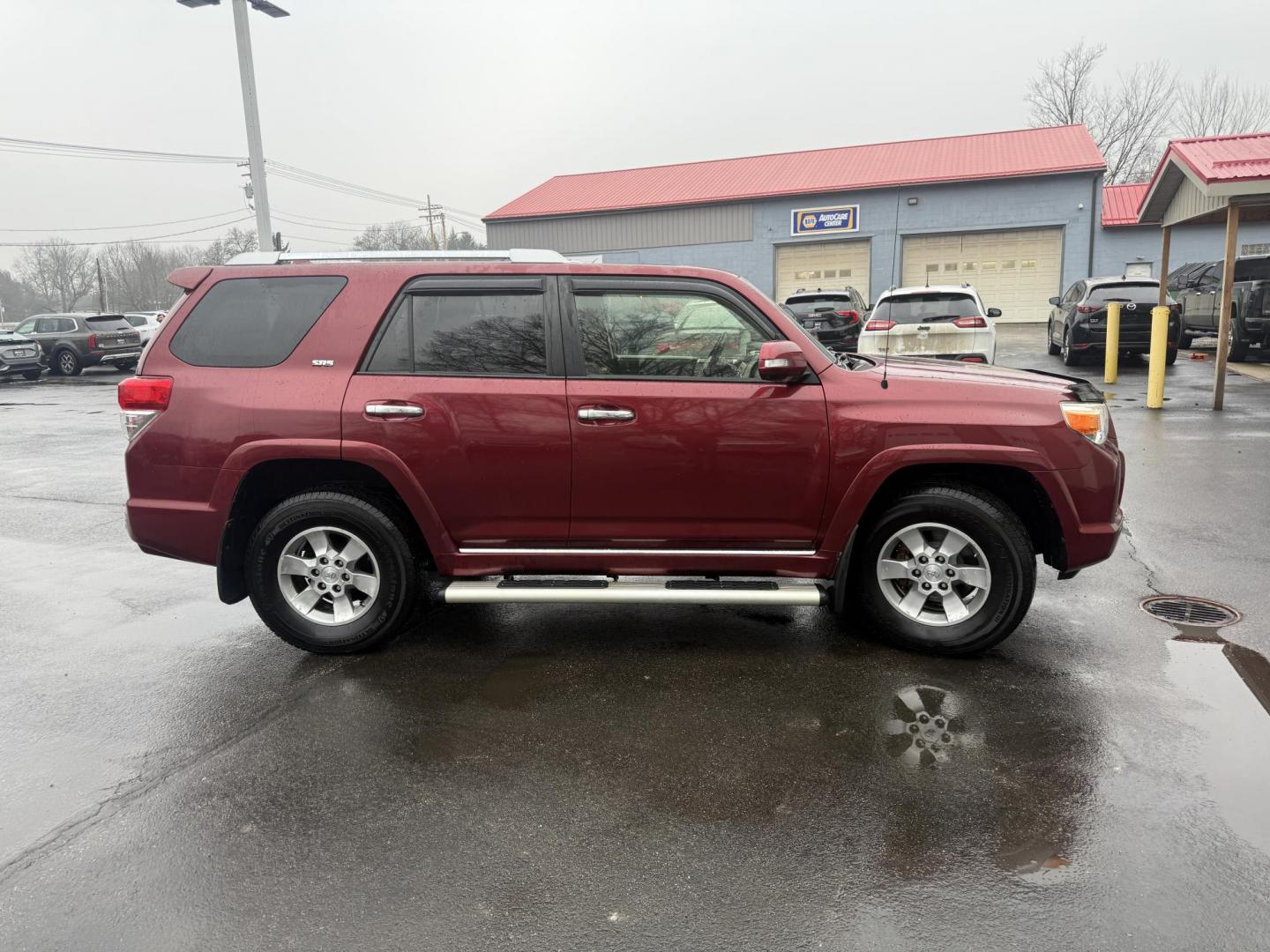 2013 Red /Black Toyota 4Runner SR5 4WD (JTEBU5JR2D5) with an 4.0L V6 DOHC 24V engine, Automatic transmission, located at 547 E. Main St., Orwell, OH, 44076, (440) 437-5893, 41.535435, -80.847855 - 2013 Toyota 4Runner SR5 4WD – Legendary Reliability, Off-Road Ready, and Packed with Practical Features! This rugged 2013 Toyota 4Runner SR5 4WD is the timeless SUV built to last a lifetime and tackle anything you throw at it! Powered by the bulletproof 4.0L V6 engine mated to a durable 5-speed a - Photo#29