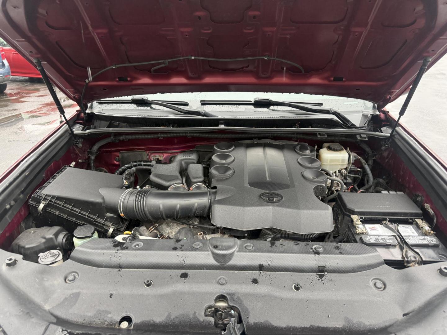 2013 Red /Black Toyota 4Runner SR5 4WD (JTEBU5JR2D5) with an 4.0L V6 DOHC 24V engine, Automatic transmission, located at 547 E. Main St., Orwell, OH, 44076, (440) 437-5893, 41.535435, -80.847855 - 2013 Toyota 4Runner SR5 4WD – Legendary Reliability, Off-Road Ready, and Packed with Practical Features! This rugged 2013 Toyota 4Runner SR5 4WD is the timeless SUV built to last a lifetime and tackle anything you throw at it! Powered by the bulletproof 4.0L V6 engine mated to a durable 5-speed a - Photo#7