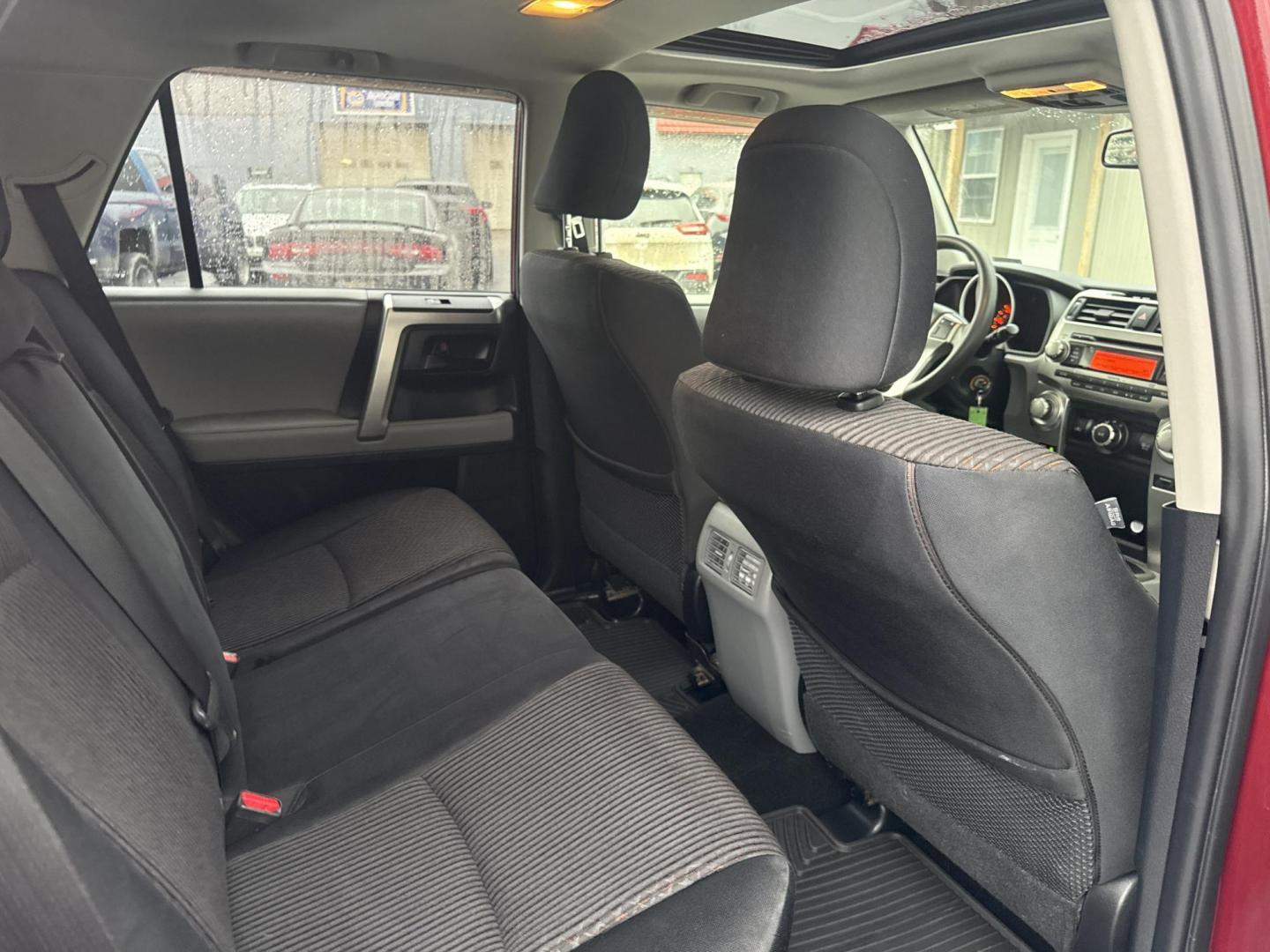 2013 Red /Black Toyota 4Runner SR5 4WD (JTEBU5JR2D5) with an 4.0L V6 DOHC 24V engine, Automatic transmission, located at 547 E. Main St., Orwell, OH, 44076, (440) 437-5893, 41.535435, -80.847855 - 2013 Toyota 4Runner SR5 4WD – Legendary Reliability, Off-Road Ready, and Packed with Practical Features! This rugged 2013 Toyota 4Runner SR5 4WD is the timeless SUV built to last a lifetime and tackle anything you throw at it! Powered by the bulletproof 4.0L V6 engine mated to a durable 5-speed a - Photo#39