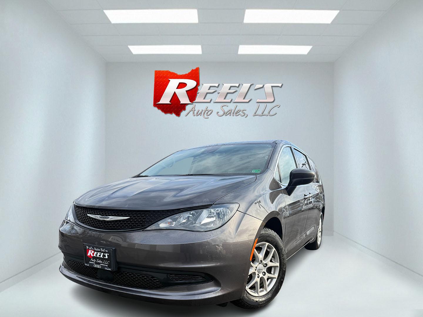 2023 Gray /Black Chrysler Voyager LX (2C4RC1CG7PR) with an 3.6L V6 DOHC 24V engine, Automatic transmission, located at 547 E. Main St., Orwell, OH, 44076, (440) 437-5893, 41.535435, -80.847855 - This 2023 Chrysler Voyager LX is the ultimate family hauler – loaded with smart features, unbeatable versatility, and that legendary Chrysler comfort everyone loves! Powered by the smooth and powerful 3.6L Pentastar V6 engine paired with a slick 9-speed automatic transmission for effortless drivi - Photo#0