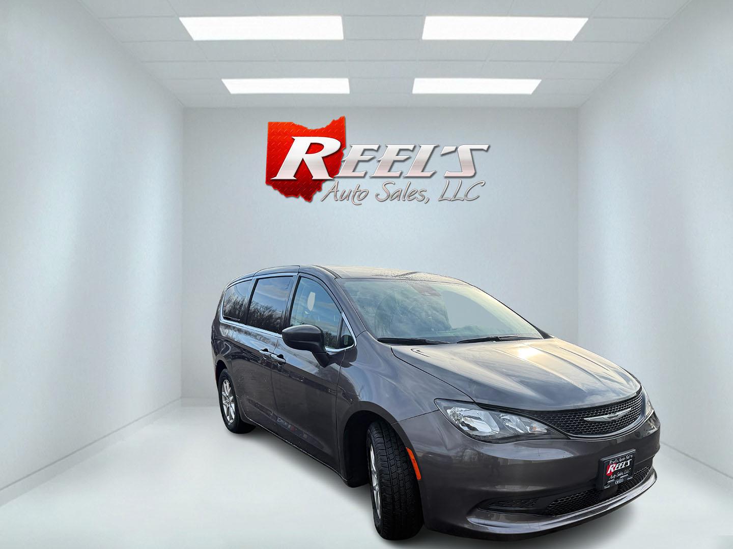 2023 Gray /Black Chrysler Voyager LX (2C4RC1CG7PR) with an 3.6L V6 DOHC 24V engine, Automatic transmission, located at 547 E. Main St., Orwell, OH, 44076, (440) 437-5893, 41.535435, -80.847855 - This 2023 Chrysler Voyager LX is the ultimate family hauler – loaded with smart features, unbeatable versatility, and that legendary Chrysler comfort everyone loves! Powered by the smooth and powerful 3.6L Pentastar V6 engine paired with a slick 9-speed automatic transmission for effortless drivi - Photo#2