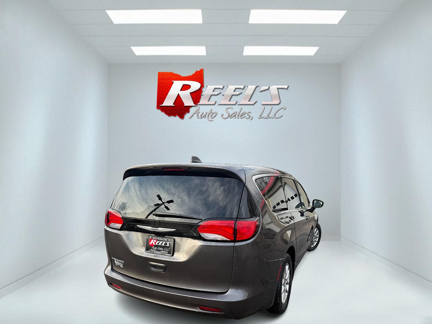 2023 Gray /Black Chrysler Voyager LX (2C4RC1CG7PR) with an 3.6L V6 DOHC 24V engine, Automatic transmission, located at 547 E. Main St., Orwell, OH, 44076, (440) 437-5893, 41.535435, -80.847855 - This 2023 Chrysler Voyager LX is the ultimate family hauler – loaded with smart features, unbeatable versatility, and that legendary Chrysler comfort everyone loves! Powered by the smooth and powerful 3.6L Pentastar V6 engine paired with a slick 9-speed automatic transmission for effortless drivi - Photo#28