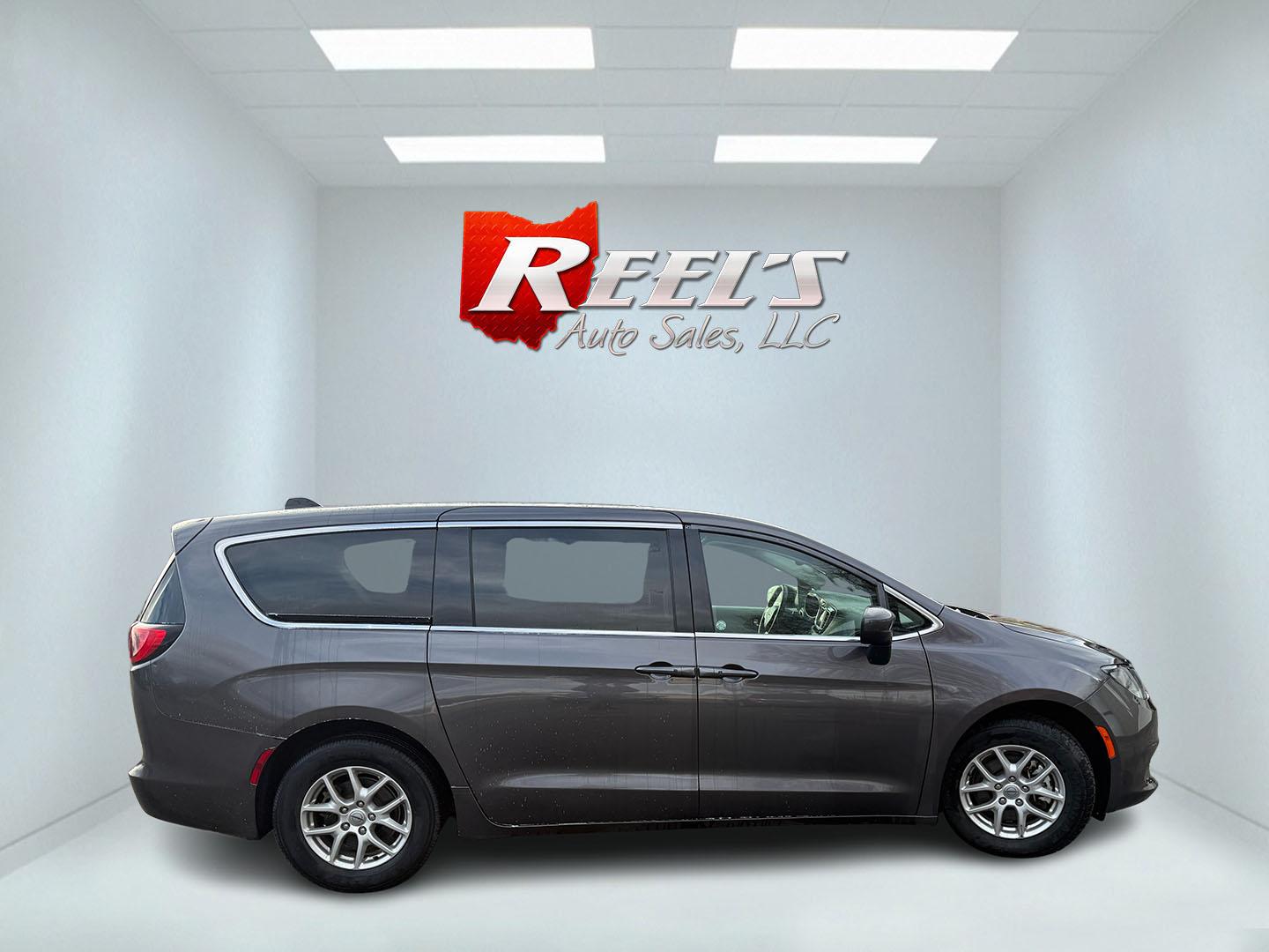 2023 Gray /Black Chrysler Voyager LX (2C4RC1CG7PR) with an 3.6L V6 DOHC 24V engine, Automatic transmission, located at 547 E. Main St., Orwell, OH, 44076, (440) 437-5893, 41.535435, -80.847855 - This 2023 Chrysler Voyager LX is the ultimate family hauler – loaded with smart features, unbeatable versatility, and that legendary Chrysler comfort everyone loves! Powered by the smooth and powerful 3.6L Pentastar V6 engine paired with a slick 9-speed automatic transmission for effortless drivi - Photo#6