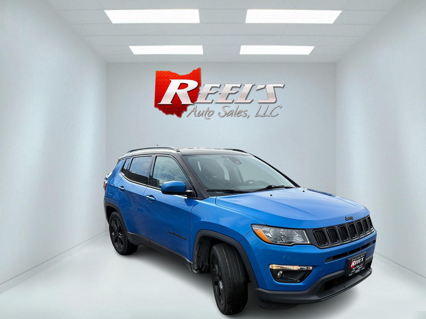 2021 Blue /Black Jeep Compass Latitude FWD (3C4NJCBB4MT) with an 2.4L I4 DOHC 16V engine, Automatic transmission, located at 11115 Chardon Rd. , Chardon, OH, 44024, (440) 214-9705, 41.580246, -81.241943 - 2021 Jeep Compass Altitude FWD – Sharp Style, Efficient Drive, and Loaded with Modern Safety & Tech! This eye-catching 2021 Jeep Compass Altitude FWD is the perfect blend of bold looks, everyday efficiency, and smart features for city streets or highway cruising! Powered by a reliable 2.4L I4 eng - Photo#2