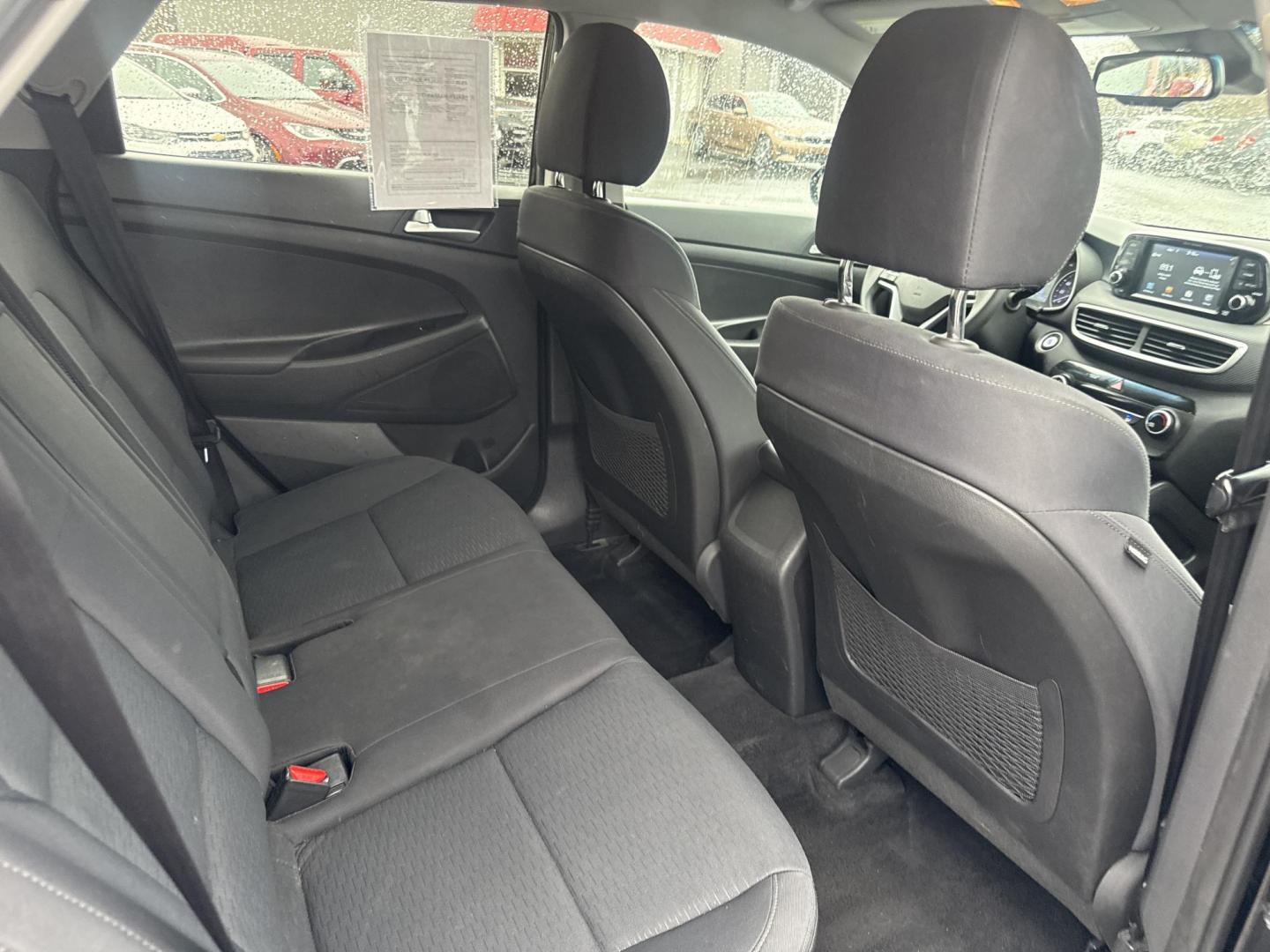 2019 Black /Black Hyundai Tucson Value AWD (KM8J3CA46KU) with an 2.0L I4 DOHC 16V engine, Automatic transmission, located at 11115 Chardon Rd. , Chardon, OH, 44024, (440) 214-9705, 41.580246, -81.241943 - 2019 Hyundai Tucson Value AWD – Reliable All-Weather Crossover with Loaded Safety, Comfort, and Everyday Smarts! This sharp 2019 Hyundai Tucson Value AWD is the perfect family-friendly SUV that balances capability, efficiency, and peace-of-mind features! Powered by a smooth 2.0L I4 GDI engine pai - Photo#31