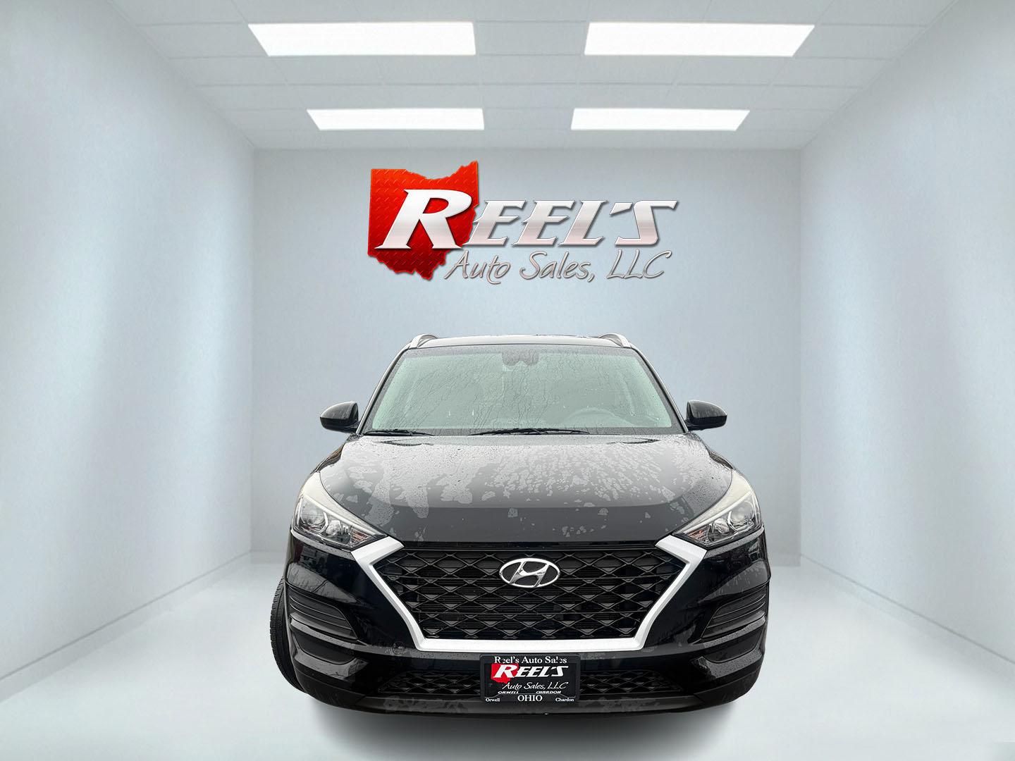 2019 Black /Black Hyundai Tucson Value AWD (KM8J3CA46KU) with an 2.0L I4 DOHC 16V engine, Automatic transmission, located at 11115 Chardon Rd. , Chardon, OH, 44024, (440) 214-9705, 41.580246, -81.241943 - 2019 Hyundai Tucson Value AWD – Reliable All-Weather Crossover with Loaded Safety, Comfort, and Everyday Smarts! This sharp 2019 Hyundai Tucson Value AWD is the perfect family-friendly SUV that balances capability, efficiency, and peace-of-mind features! Powered by a smooth 2.0L I4 GDI engine pai - Photo#1