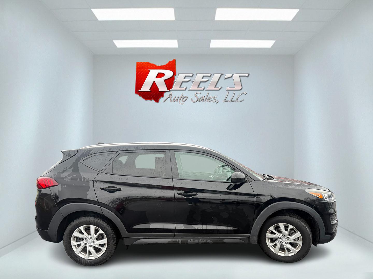 2019 Black /Black Hyundai Tucson Value AWD (KM8J3CA46KU) with an 2.0L I4 DOHC 16V engine, Automatic transmission, located at 11115 Chardon Rd. , Chardon, OH, 44024, (440) 214-9705, 41.580246, -81.241943 - 2019 Hyundai Tucson Value AWD – Reliable All-Weather Crossover with Loaded Safety, Comfort, and Everyday Smarts! This sharp 2019 Hyundai Tucson Value AWD is the perfect family-friendly SUV that balances capability, efficiency, and peace-of-mind features! Powered by a smooth 2.0L I4 GDI engine pai - Photo#19
