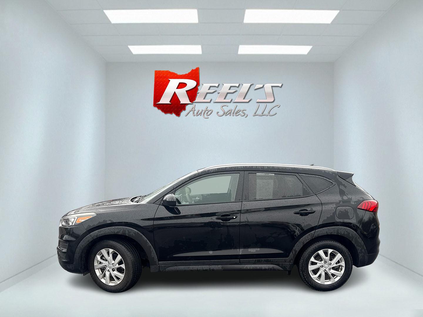 2019 Black /Black Hyundai Tucson Value AWD (KM8J3CA46KU) with an 2.0L I4 DOHC 16V engine, Automatic transmission, located at 11115 Chardon Rd. , Chardon, OH, 44024, (440) 214-9705, 41.580246, -81.241943 - 2019 Hyundai Tucson Value AWD – Reliable All-Weather Crossover with Loaded Safety, Comfort, and Everyday Smarts! This sharp 2019 Hyundai Tucson Value AWD is the perfect family-friendly SUV that balances capability, efficiency, and peace-of-mind features! Powered by a smooth 2.0L I4 GDI engine pai - Photo#26