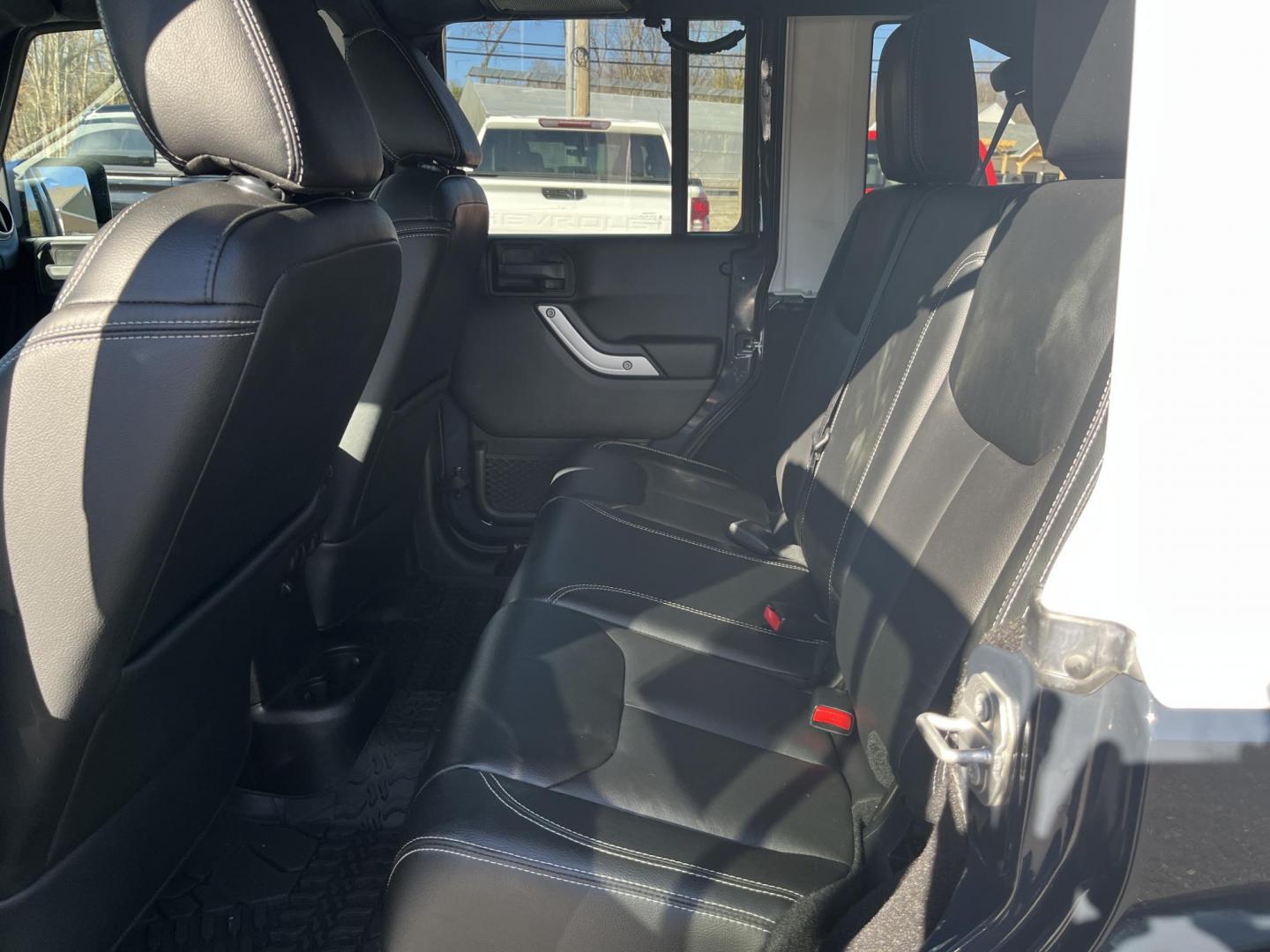 2017 Gray /Black Jeep Wrangler Unlimited Sahara 4WD (1C4BJWEG8HL) with an 3.6L V6 DOHC 24V engine, Automatic transmission, located at 11115 Chardon Rd. , Chardon, OH, 44024, (440) 214-9705, 41.580246, -81.241943 - 2017 Jeep Wrangler Unlimited Chief Edition 4WD – Special-Edition Icon with Premium Touches and True Off-Road DNA! This 2017 Jeep Wrangler Unlimited Chief Edition 4WD is a standout collector's gem that blends classic Jeep toughness with exclusive style upgrades! Powered by the reliable 3.6L Pentas - Photo#25