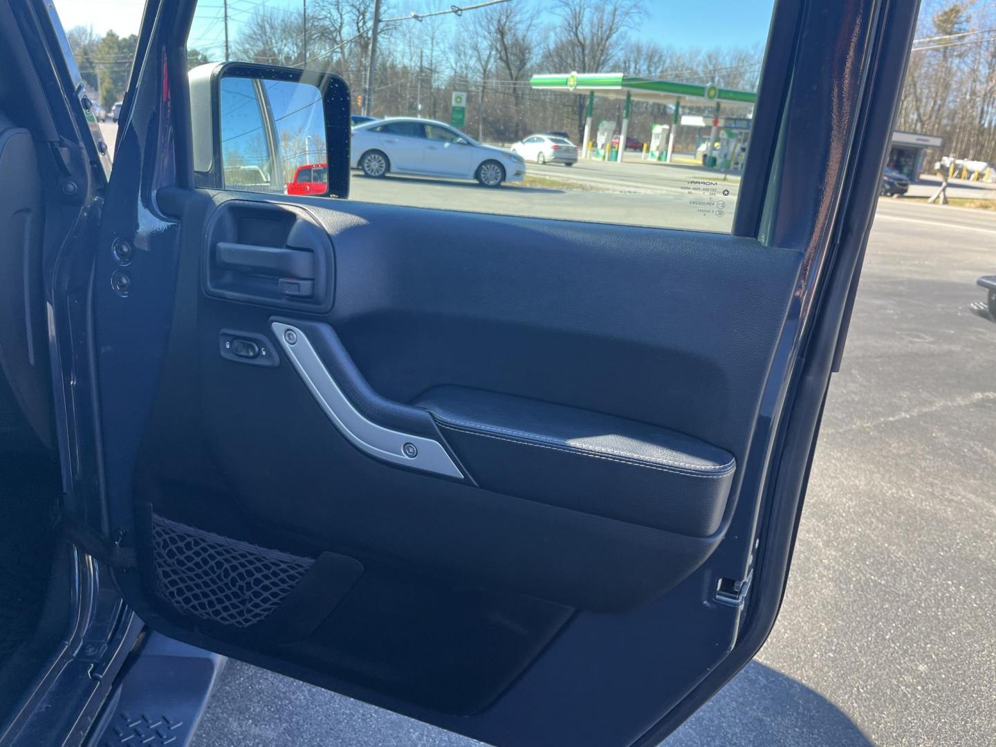 2017 Gray /Black Jeep Wrangler Unlimited Sahara 4WD (1C4BJWEG8HL) with an 3.6L V6 DOHC 24V engine, Automatic transmission, located at 11115 Chardon Rd. , Chardon, OH, 44024, (440) 214-9705, 41.580246, -81.241943 - 2017 Jeep Wrangler Unlimited Chief Edition 4WD – Special-Edition Icon with Premium Touches and True Off-Road DNA! This 2017 Jeep Wrangler Unlimited Chief Edition 4WD is a standout collector's gem that blends classic Jeep toughness with exclusive style upgrades! Powered by the reliable 3.6L Pentas - Photo#28