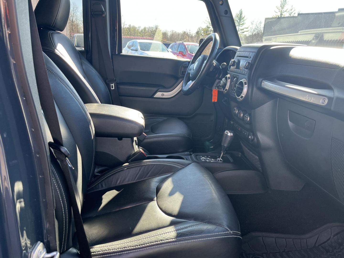 2017 Gray /Black Jeep Wrangler Unlimited Sahara 4WD (1C4BJWEG8HL) with an 3.6L V6 DOHC 24V engine, Automatic transmission, located at 11115 Chardon Rd. , Chardon, OH, 44024, (440) 214-9705, 41.580246, -81.241943 - 2017 Jeep Wrangler Unlimited Chief Edition 4WD – Special-Edition Icon with Premium Touches and True Off-Road DNA! This 2017 Jeep Wrangler Unlimited Chief Edition 4WD is a standout collector's gem that blends classic Jeep toughness with exclusive style upgrades! Powered by the reliable 3.6L Pentas - Photo#29