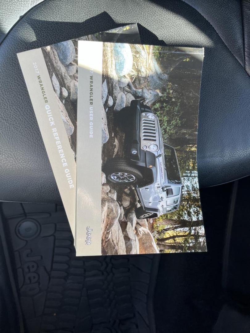 2017 Gray /Black Jeep Wrangler Unlimited Sahara 4WD (1C4BJWEG8HL) with an 3.6L V6 DOHC 24V engine, Automatic transmission, located at 11115 Chardon Rd. , Chardon, OH, 44024, (440) 214-9705, 41.580246, -81.241943 - 2017 Jeep Wrangler Unlimited Chief Edition 4WD – Special-Edition Icon with Premium Touches and True Off-Road DNA! This 2017 Jeep Wrangler Unlimited Chief Edition 4WD is a standout collector's gem that blends classic Jeep toughness with exclusive style upgrades! Powered by the reliable 3.6L Pentas - Photo#32