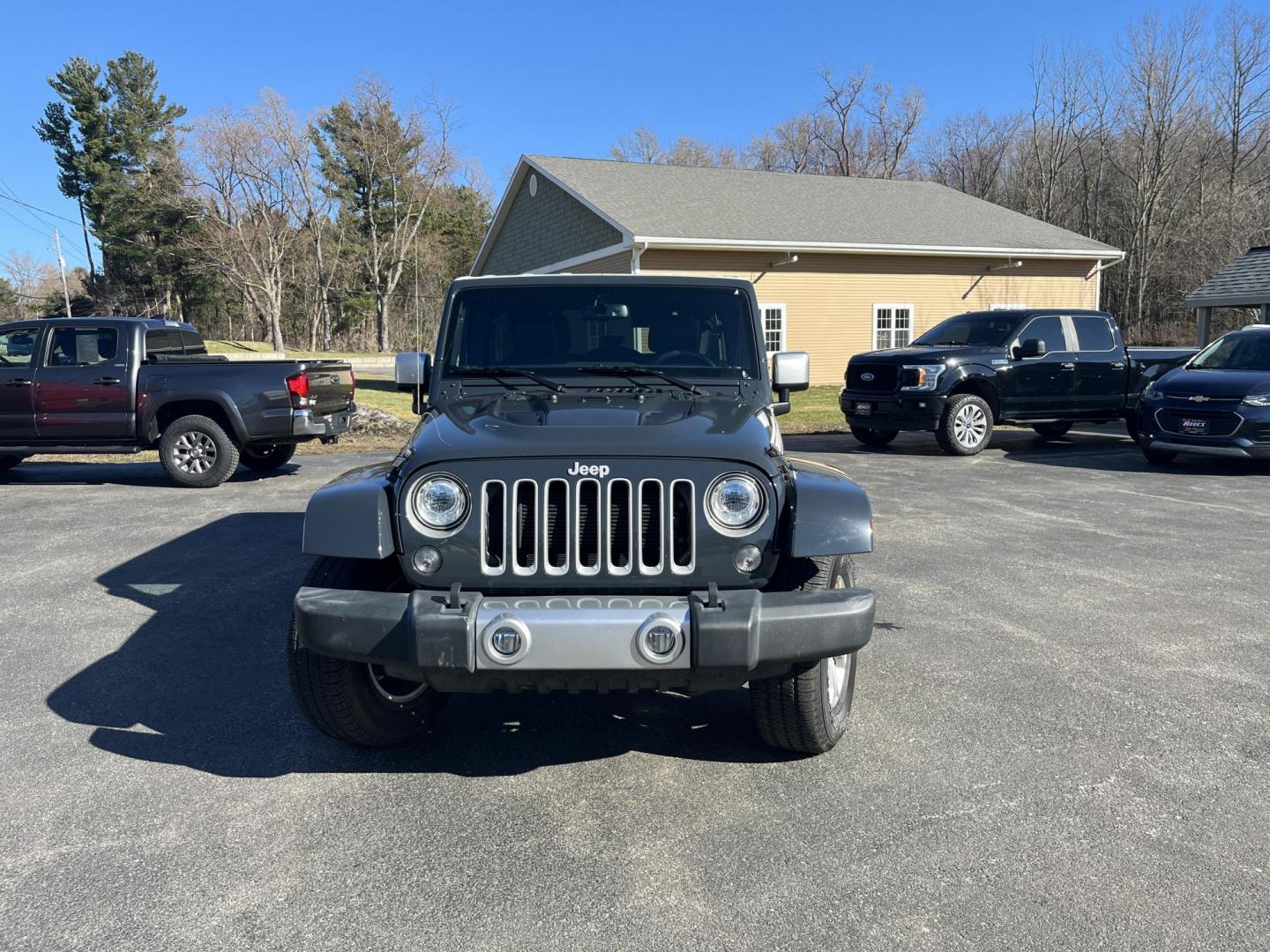 2017 Gray /Black Jeep Wrangler Unlimited Sahara 4WD (1C4BJWEG8HL) with an 3.6L V6 DOHC 24V engine, Automatic transmission, located at 11115 Chardon Rd. , Chardon, OH, 44024, (440) 214-9705, 41.580246, -81.241943 - 2017 Jeep Wrangler Unlimited Chief Edition 4WD – Special-Edition Icon with Premium Touches and True Off-Road DNA! This 2017 Jeep Wrangler Unlimited Chief Edition 4WD is a standout collector's gem that blends classic Jeep toughness with exclusive style upgrades! Powered by the reliable 3.6L Pentas - Photo#1
