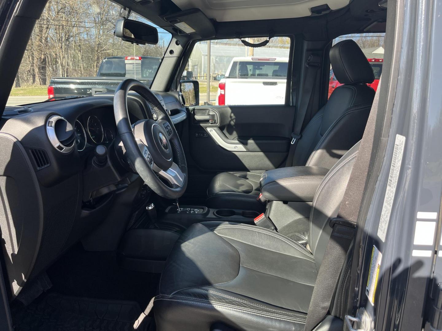 2017 Gray /Black Jeep Wrangler Unlimited Sahara 4WD (1C4BJWEG8HL) with an 3.6L V6 DOHC 24V engine, Automatic transmission, located at 11115 Chardon Rd. , Chardon, OH, 44024, (440) 214-9705, 41.580246, -81.241943 - 2017 Jeep Wrangler Unlimited Chief Edition 4WD – Special-Edition Icon with Premium Touches and True Off-Road DNA! This 2017 Jeep Wrangler Unlimited Chief Edition 4WD is a standout collector's gem that blends classic Jeep toughness with exclusive style upgrades! Powered by the reliable 3.6L Pentas - Photo#16