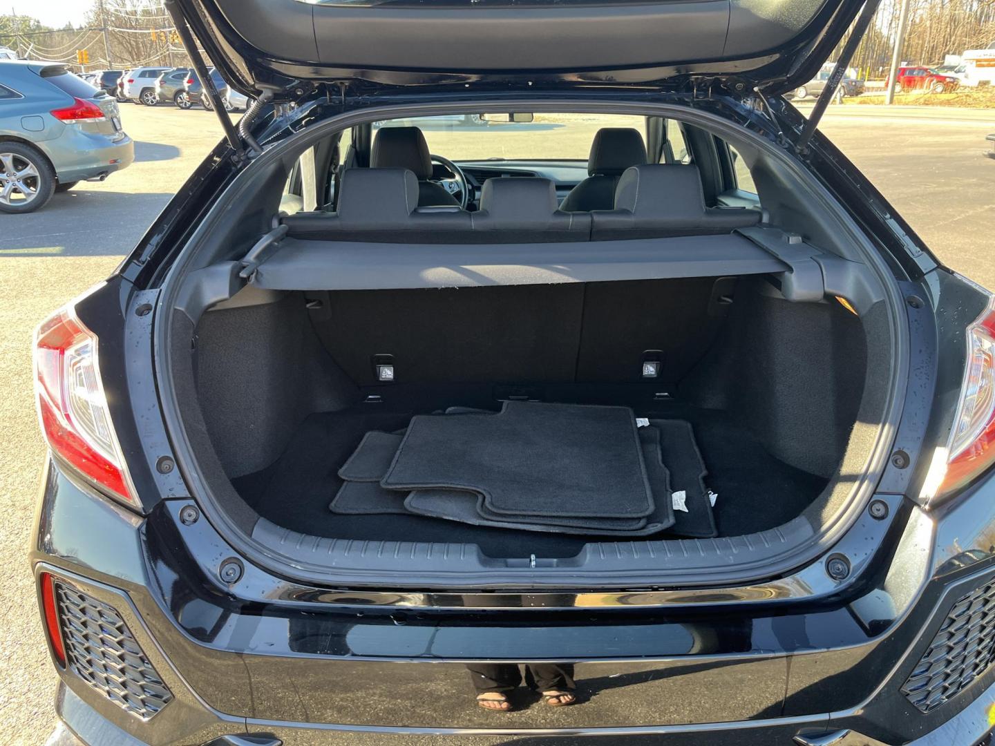 2019 Black /Black Honda Civic Sport CVT (SHHFK7H40KU) with an 1.5 I4 DOHC 16V TURBO engine, Automatic transmission, located at 11115 Chardon Rd. , Chardon, OH, 44024, (440) 214-9705, 41.580246, -81.241943 - 2019 Honda Civic Sport 5Dr – Sporty Hatchback with Turbo Kick, Epic Efficiency, and Loaded Safety Tech! This sharp 2019 Honda Civic Sport 5Dr is the perfect blend of fun-to-drive attitude, incredible fuel savings, and modern smarts – the hatchback everyone wishes they had! Powered by the respon - Photo#14