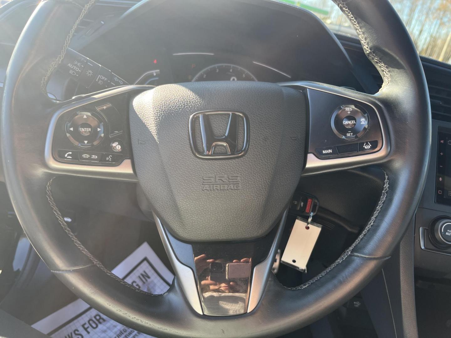 2019 Black /Black Honda Civic Sport CVT (SHHFK7H40KU) with an 1.5 I4 DOHC 16V TURBO engine, Automatic transmission, located at 11115 Chardon Rd. , Chardon, OH, 44024, (440) 214-9705, 41.580246, -81.241943 - 2019 Honda Civic Sport 5Dr – Sporty Hatchback with Turbo Kick, Epic Efficiency, and Loaded Safety Tech! This sharp 2019 Honda Civic Sport 5Dr is the perfect blend of fun-to-drive attitude, incredible fuel savings, and modern smarts – the hatchback everyone wishes they had! Powered by the respon - Photo#19