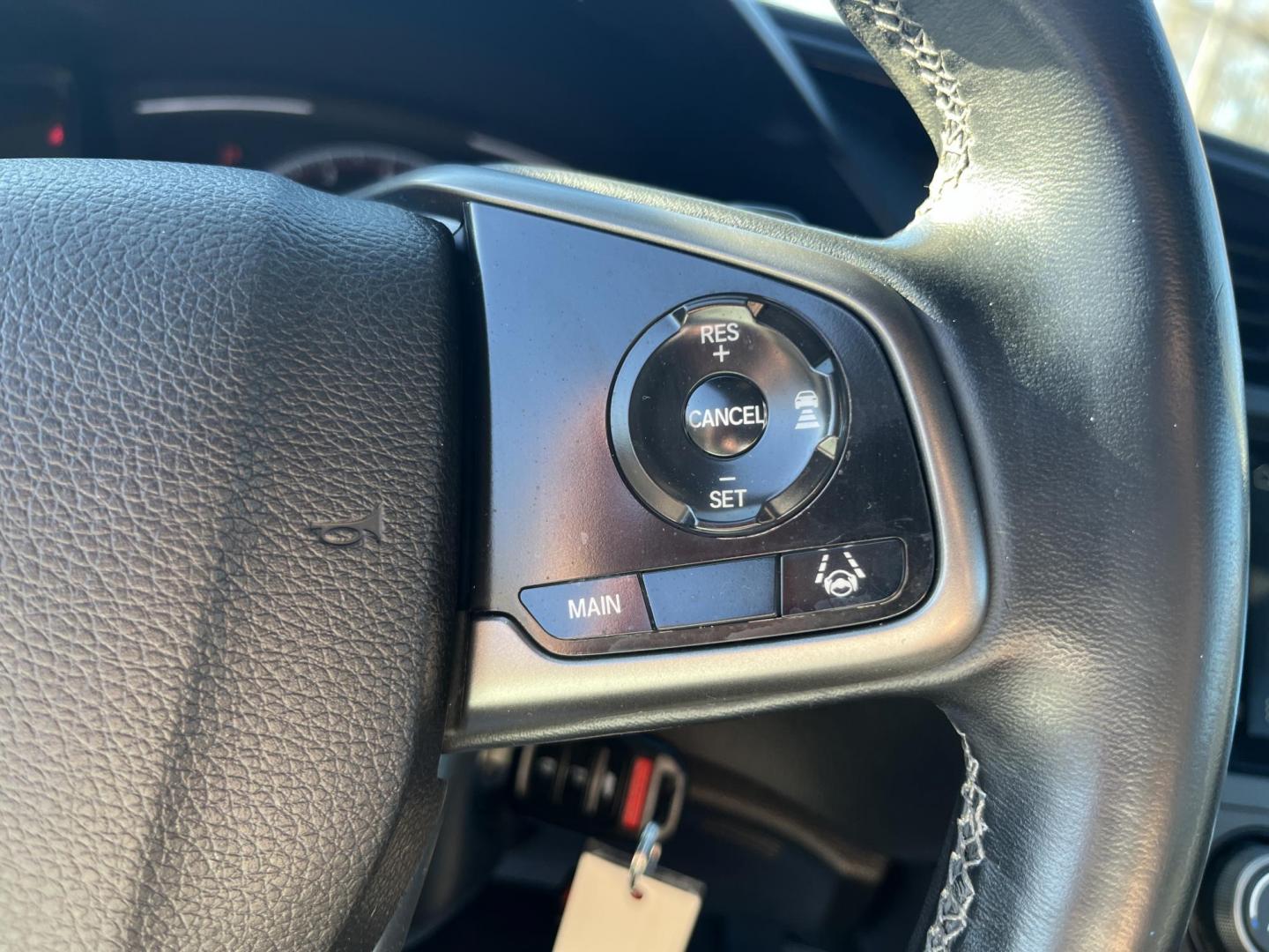 2019 Black /Black Honda Civic Sport CVT (SHHFK7H40KU) with an 1.5 I4 DOHC 16V TURBO engine, Automatic transmission, located at 11115 Chardon Rd. , Chardon, OH, 44024, (440) 214-9705, 41.580246, -81.241943 - 2019 Honda Civic Sport 5Dr – Sporty Hatchback with Turbo Kick, Epic Efficiency, and Loaded Safety Tech! This sharp 2019 Honda Civic Sport 5Dr is the perfect blend of fun-to-drive attitude, incredible fuel savings, and modern smarts – the hatchback everyone wishes they had! Powered by the respon - Photo#21