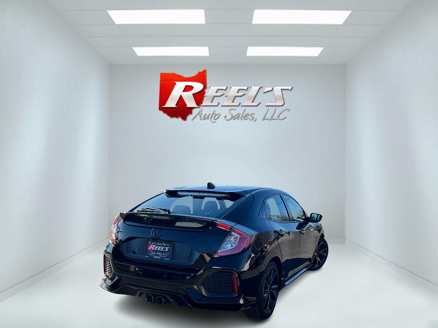 2019 Black /Black Honda Civic Sport CVT (SHHFK7H40KU) with an 1.5 I4 DOHC 16V TURBO engine, Automatic transmission, located at 11115 Chardon Rd. , Chardon, OH, 44024, (440) 214-9705, 41.580246, -81.241943 - 2019 Honda Civic Sport 5Dr – Sporty Hatchback with Turbo Kick, Epic Efficiency, and Loaded Safety Tech! This sharp 2019 Honda Civic Sport 5Dr is the perfect blend of fun-to-drive attitude, incredible fuel savings, and modern smarts – the hatchback everyone wishes they had! Powered by the respon - Photo#6