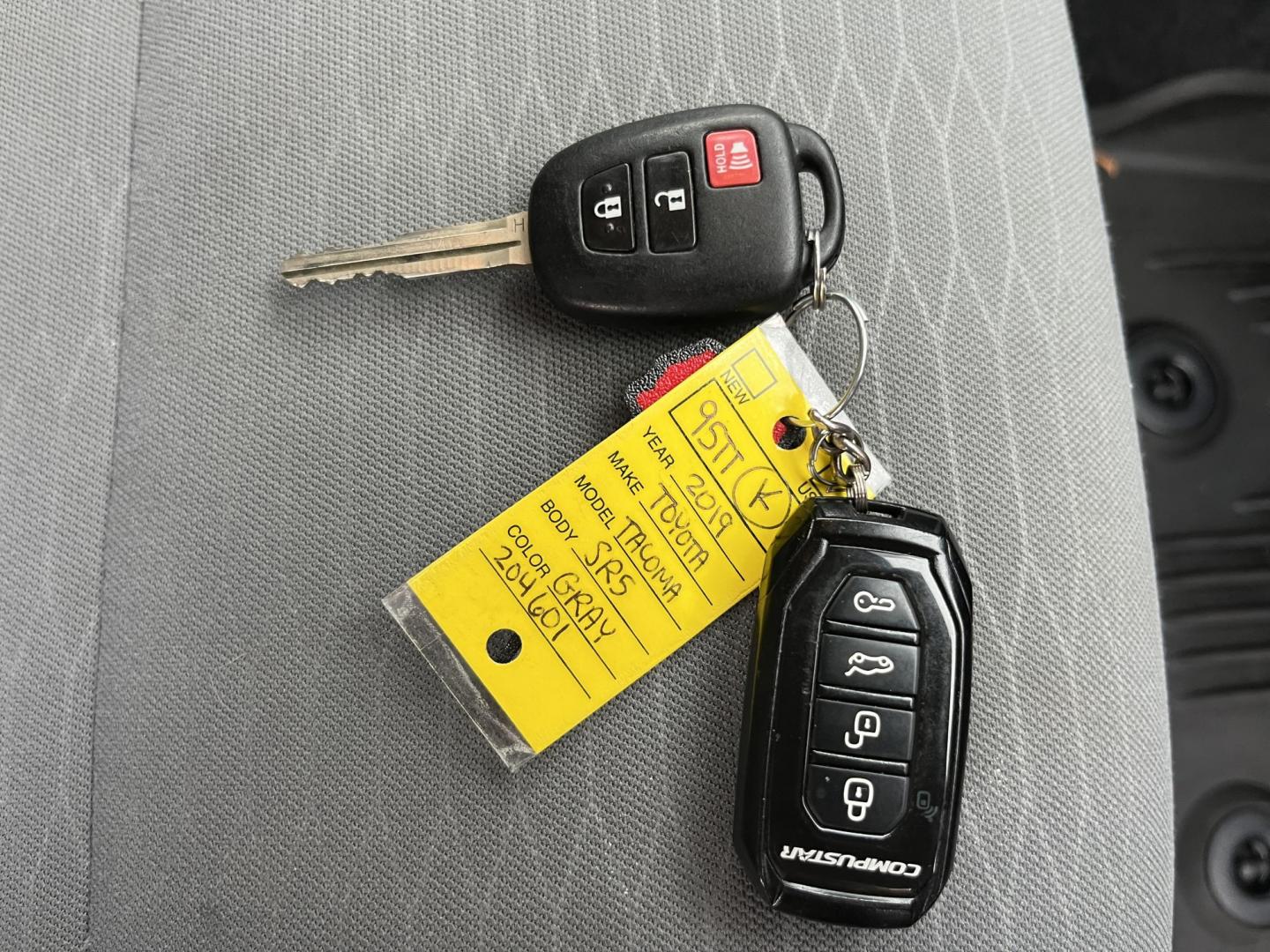 2019 Gray /Black Toyota Tacoma SR5 Double Cab Short Bed V6 6AT 4WD (3TMCZ5AN0KM) with an 3.6L V6 DOHC 24V engine, Automatic transmission, located at 11115 Chardon Rd. , Chardon, OH, 44024, (440) 214-9705, 41.580246, -81.241943 - This 2019 Toyota Tacoma SR5 Double Cab 4WD is a rugged, reliable legend in the making – tough, capable, and looking sharp in Magnetic Gray Metallic with four brand new all-terrain tires ready to hit the trails or the highway! Powered by the potent 3.5L D-4S V6 engine delivering serious torque and - Photo#34