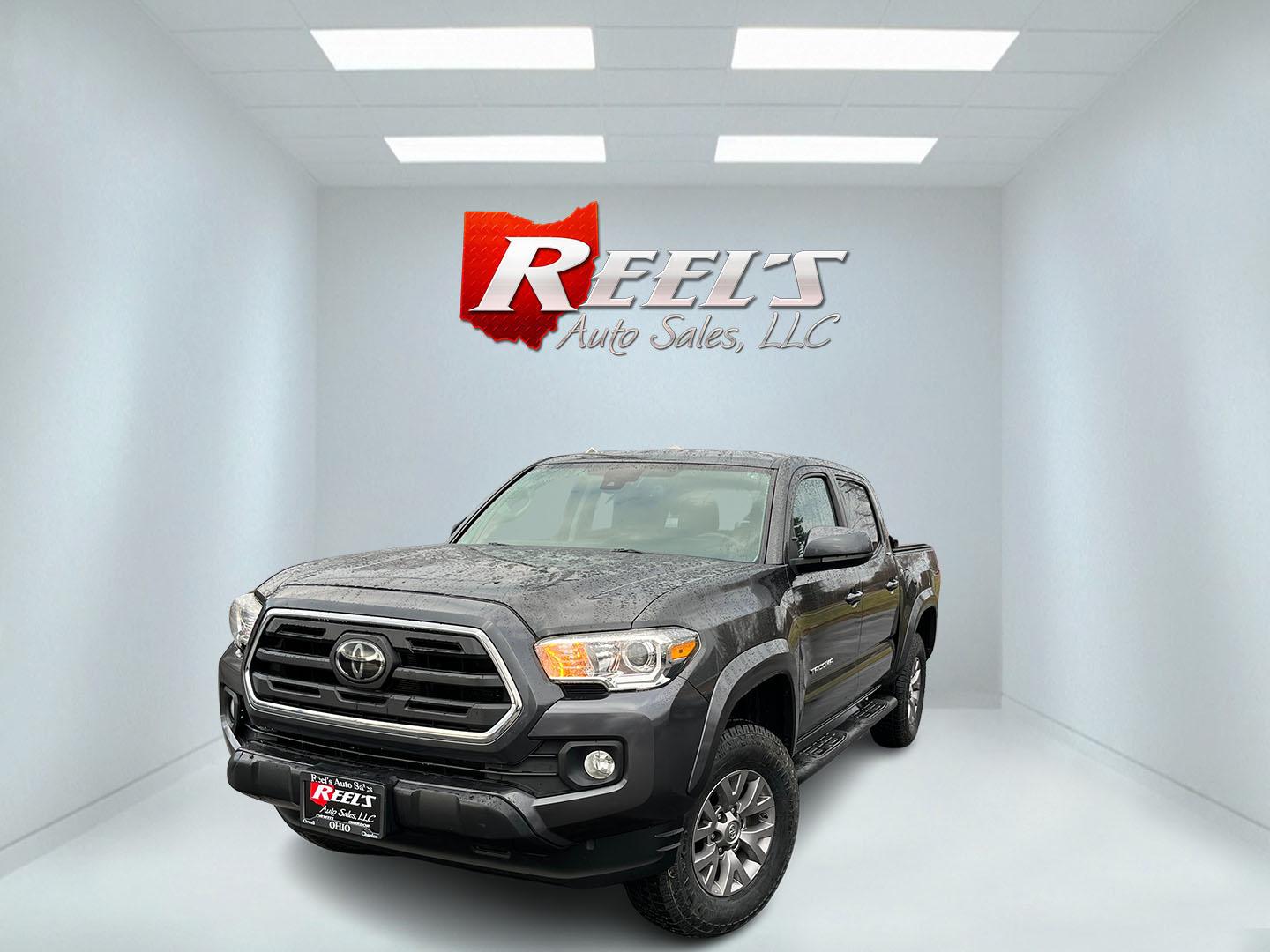 2019 Gray /Black Toyota Tacoma SR5 Double Cab Short Bed V6 6AT 4WD (3TMCZ5AN0KM) with an 3.6L V6 DOHC 24V engine, Automatic transmission, located at 11115 Chardon Rd. , Chardon, OH, 44024, (440) 214-9705, 41.580246, -81.241943 - This 2019 Toyota Tacoma SR5 Double Cab 4WD is a rugged, reliable legend in the making – tough, capable, and looking sharp in Magnetic Gray Metallic with four brand new all-terrain tires ready to hit the trails or the highway! Powered by the potent 3.5L D-4S V6 engine delivering serious torque and - Photo#0