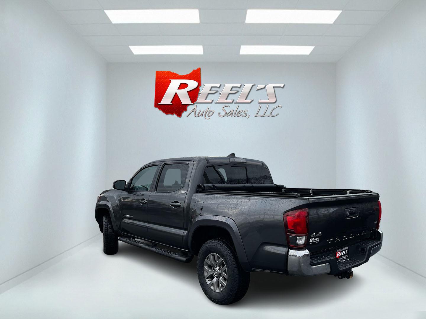 2019 Gray /Black Toyota Tacoma SR5 Double Cab Short Bed V6 6AT 4WD (3TMCZ5AN0KM) with an 3.6L V6 DOHC 24V engine, Automatic transmission, located at 11115 Chardon Rd. , Chardon, OH, 44024, (440) 214-9705, 41.580246, -81.241943 - This 2019 Toyota Tacoma SR5 Double Cab 4WD is a rugged, reliable legend in the making – tough, capable, and looking sharp in Magnetic Gray Metallic with four brand new all-terrain tires ready to hit the trails or the highway! Powered by the potent 3.5L D-4S V6 engine delivering serious torque and - Photo#9