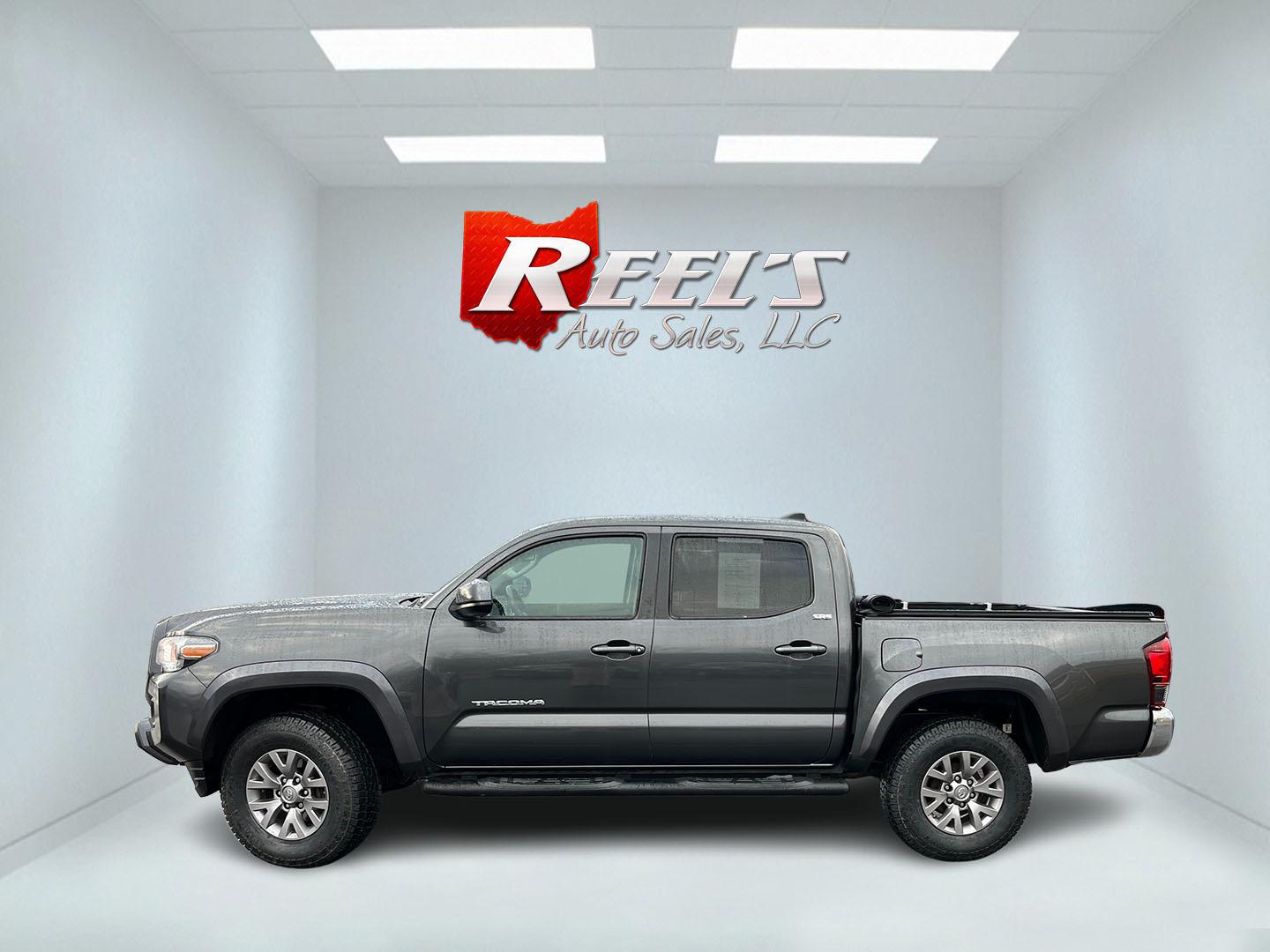 2019 Gray /Black Toyota Tacoma SR5 Double Cab Short Bed V6 6AT 4WD (3TMCZ5AN0KM) with an 3.6L V6 DOHC 24V engine, Automatic transmission, located at 11115 Chardon Rd. , Chardon, OH, 44024, (440) 214-9705, 41.580246, -81.241943 - This 2019 Toyota Tacoma SR5 Double Cab 4WD is a rugged, reliable legend in the making – tough, capable, and looking sharp in Magnetic Gray Metallic with four brand new all-terrain tires ready to hit the trails or the highway! Powered by the potent 3.5L D-4S V6 engine delivering serious torque and - Photo#11
