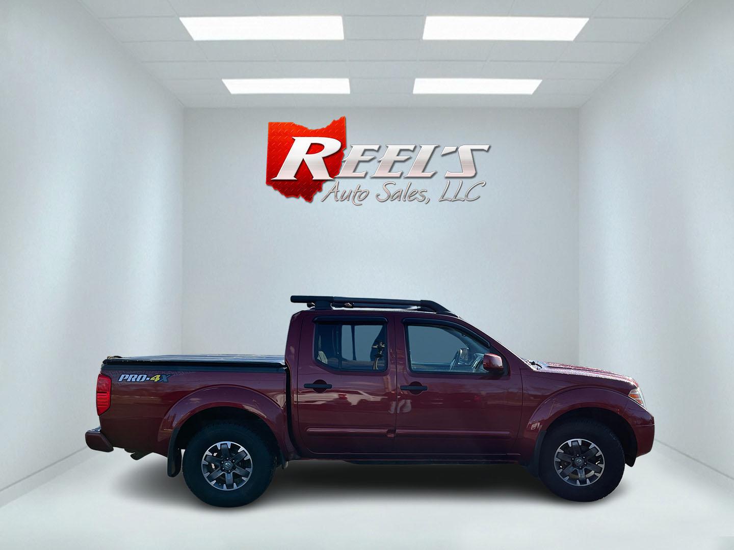2018 Red /Gray Nissan Frontier Pro-4X Crew Cab 5AT 4WD (1N6AD0EV2JN) with an 4.0L V6 DOHC 24V engine, Automatic transmission, located at 11115 Chardon Rd. , Chardon, OH, 44024, (440) 214-9705, 41.580246, -81.241943 - 2018 Nissan Frontier Pro-4X Crew Cab 4WD – Off-Road Ready Beast with Premium Upgrades and Serious Towing Muscle! This tough 2018 Nissan Frontier Pro-4X Crew Cab 4WD is built for adventure and work alike – the real deal off-roader that still delivers everyday comfort! Powered by the proven 4.0L - Photo#5