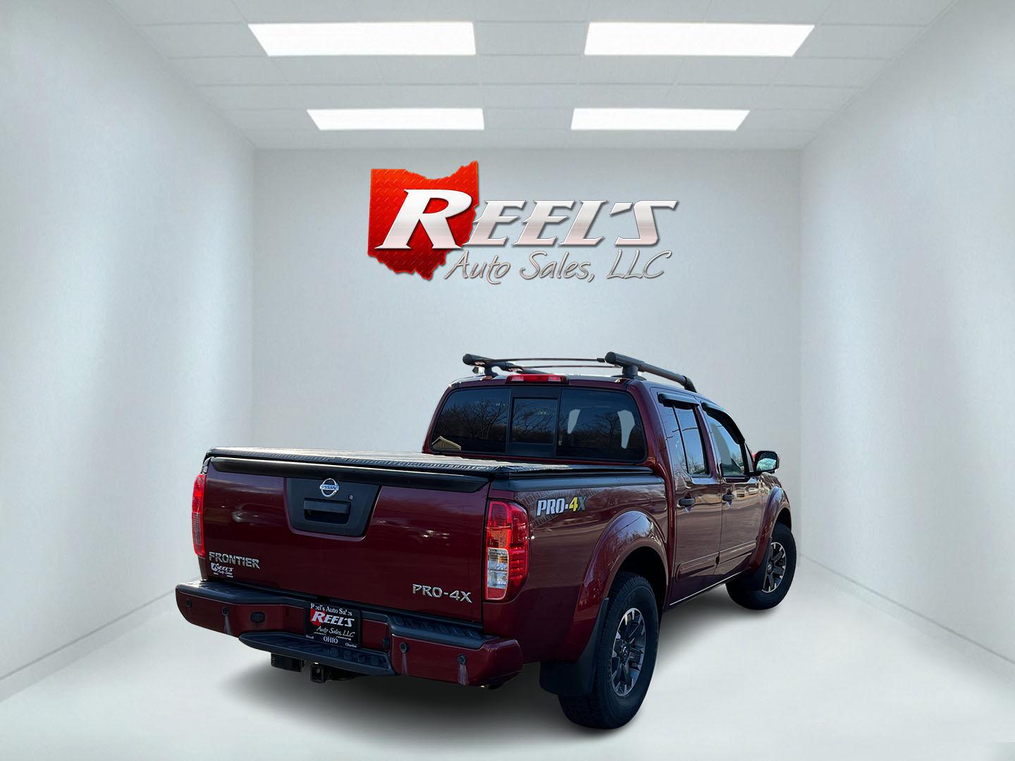 2018 Red /Gray Nissan Frontier Pro-4X Crew Cab 5AT 4WD (1N6AD0EV2JN) with an 4.0L V6 DOHC 24V engine, Automatic transmission, located at 11115 Chardon Rd. , Chardon, OH, 44024, (440) 214-9705, 41.580246, -81.241943 - 2018 Nissan Frontier Pro-4X Crew Cab 4WD – Off-Road Ready Beast with Premium Upgrades and Serious Towing Muscle! This tough 2018 Nissan Frontier Pro-4X Crew Cab 4WD is built for adventure and work alike – the real deal off-roader that still delivers everyday comfort! Powered by the proven 4.0L - Photo#6